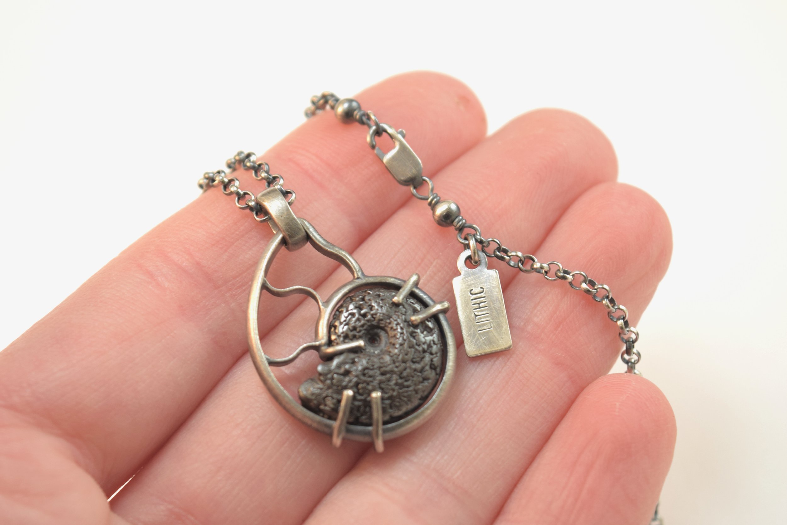 Large Hematite Ammonite Necklace.jpeg