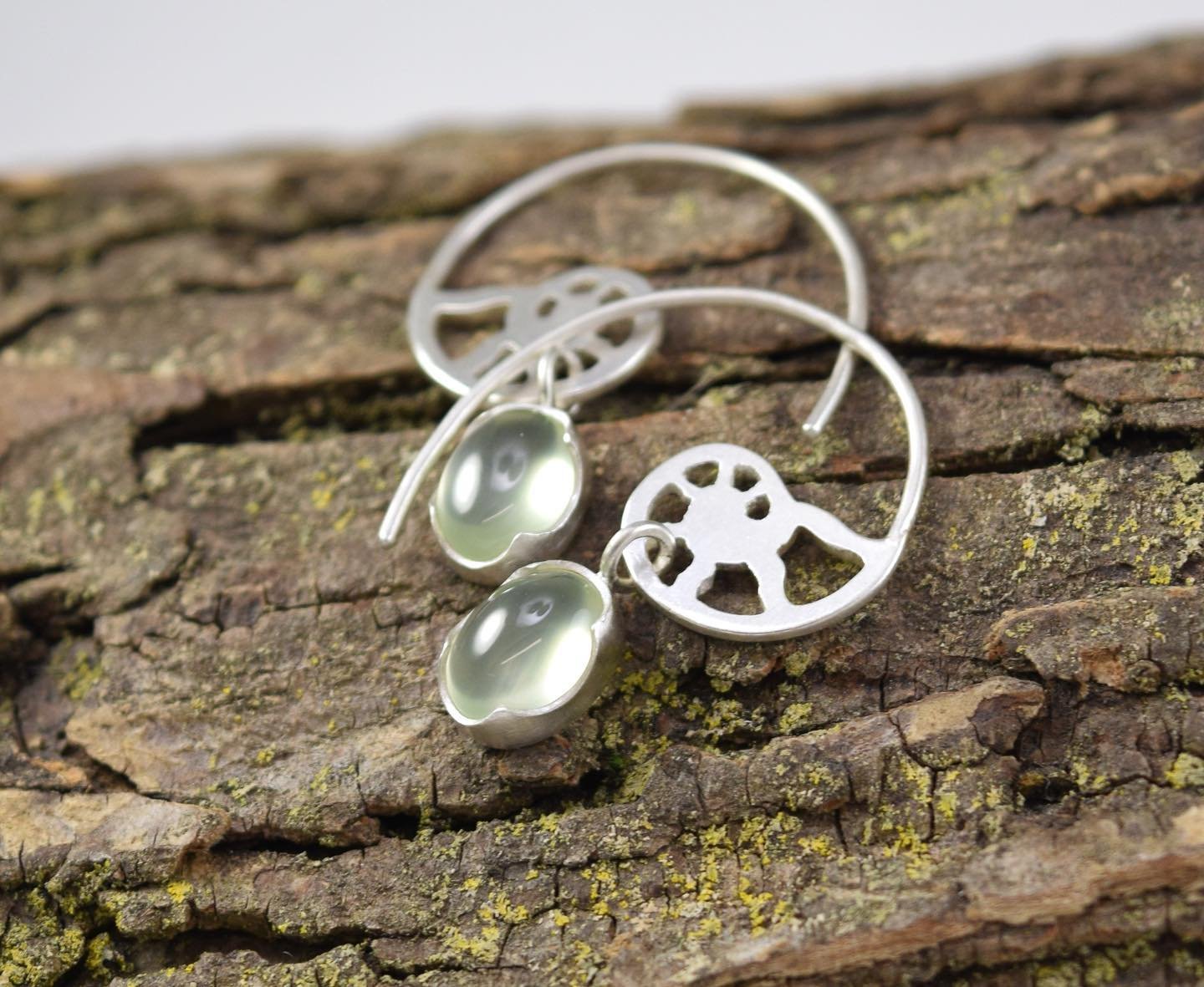 New ammonite fossil themed earrings with prehnite! 

These were part of the shop update this week including a new group of stacking rings and a clearance ring in an old design of mine.