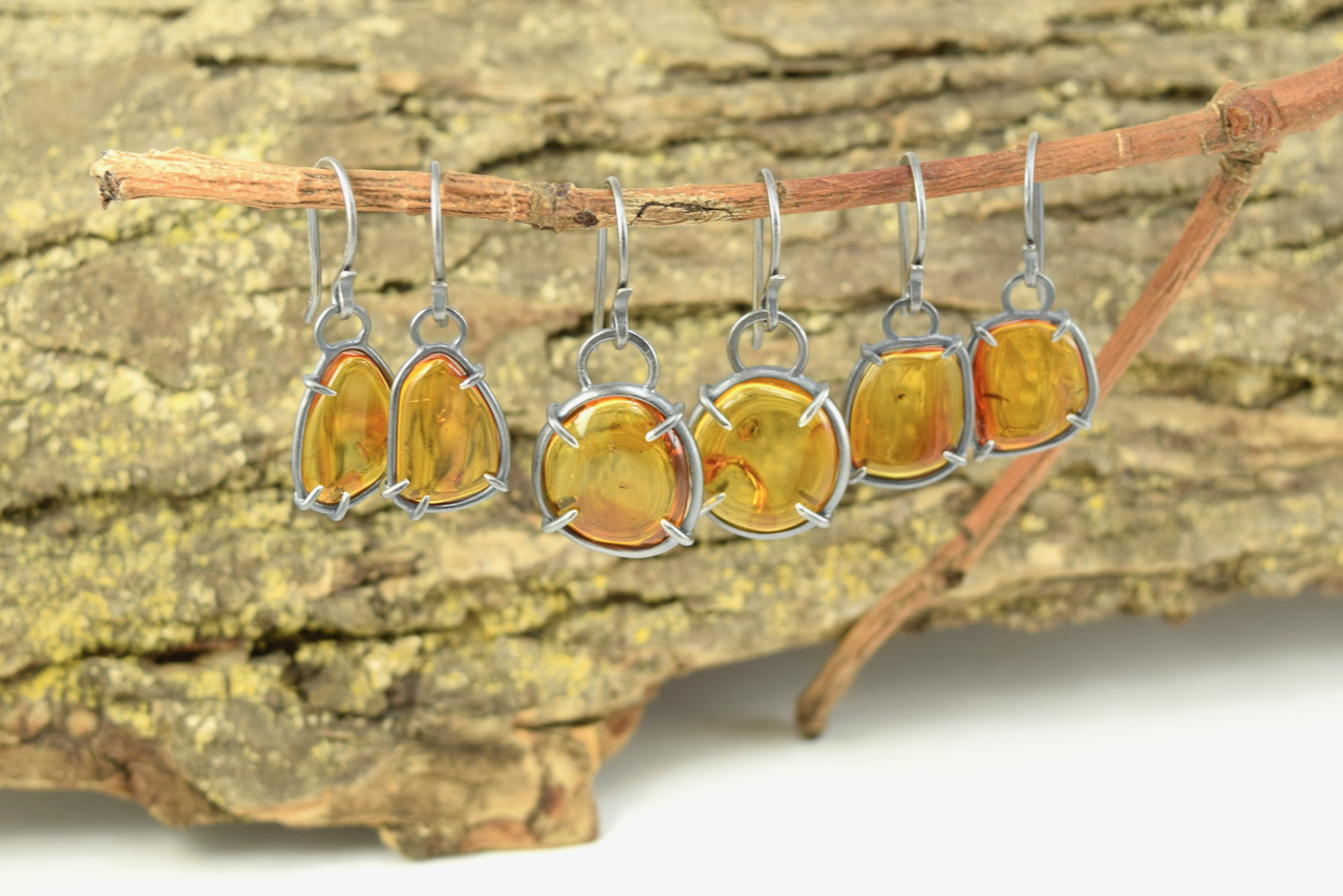 Baltic Insect Amber Earrings - All.png