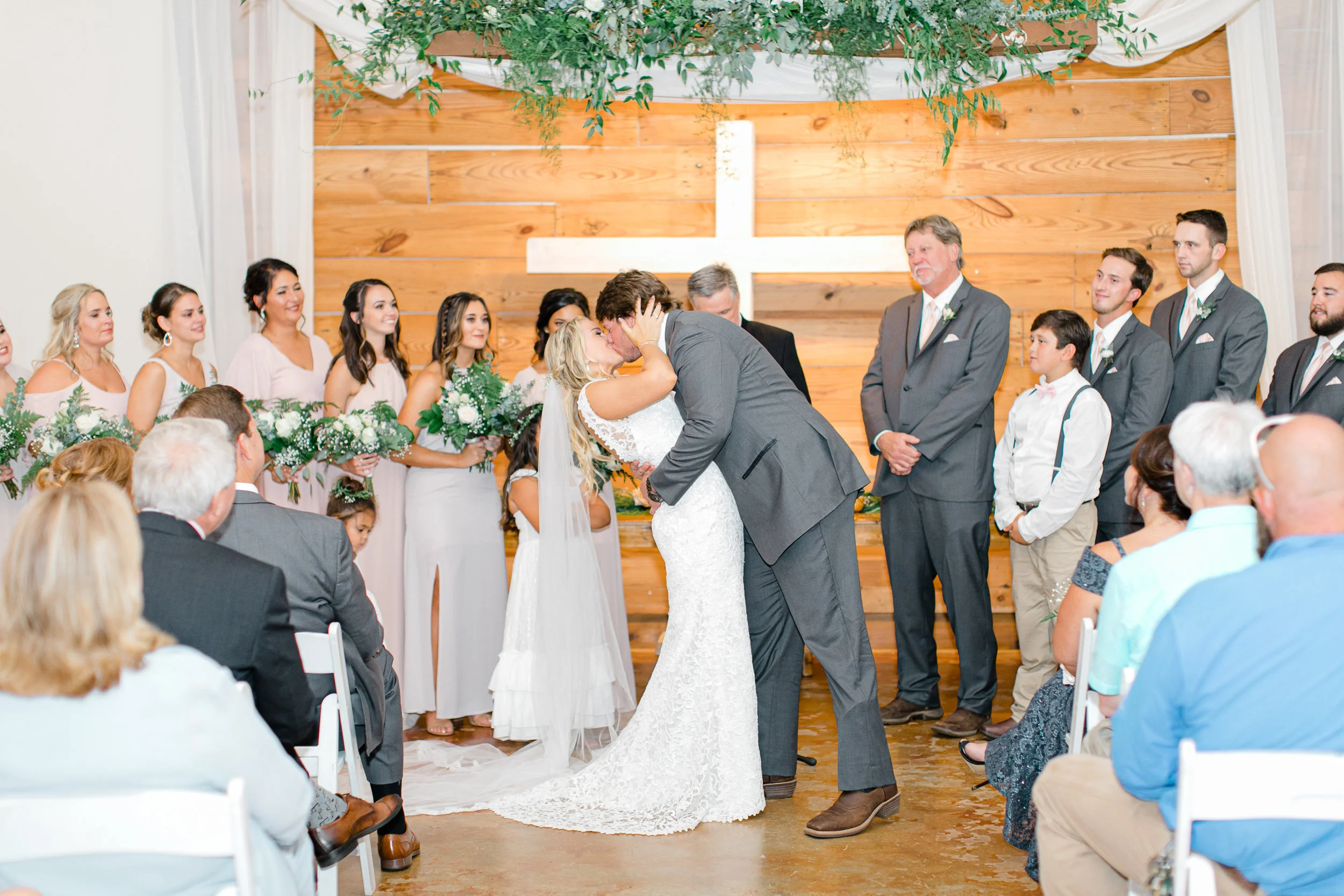 Our ceremony did not go as planned. I had a mental breakdown. I was so upset that my “dream” of getting married outside in front a white cross was ruined. It poured down rain minutes before I was supposed to walk down the aisle. The only option was for our wedding planner and her crew along with all of the guys that graciously volunteered, to move everything they could inside and complete rearrange the reception room so that we could have our ceremony there. THEY MADE IT HAPPEN! In minutes, my family and friends and wedding planners recreated the entire ceremony and made all of my dreams come true. I now know, this was all a part of God’s plan. God knew that we wanted Him to be the center of our ceremony and for the attention to be on us and our God. And It was just that. I felt the Lord move through the room. Every verse that was read, every word of each song that was sang, each kiss, clap, tear, and special moment had God’s hand directly over it. Thank you Lord for bringing the storm. For being present in our ceremony.