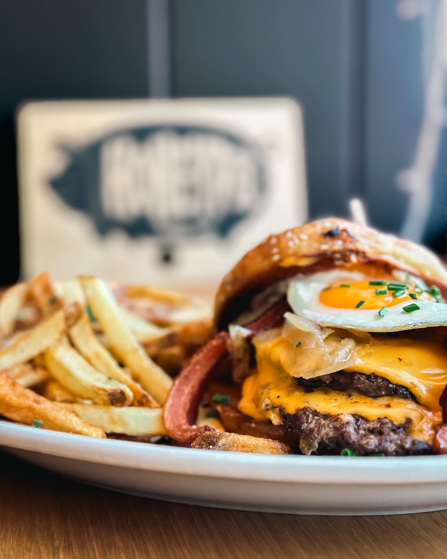 While the nice weather comes and goes (sometimes MULTIPLE TIMES in the same day) the fan fave Honeypie Burger is here to stay. Available for breakfast, brunch, lunch, and dinner.

Yes, that means you can get this 9am til 9pm every day of the week. 
A