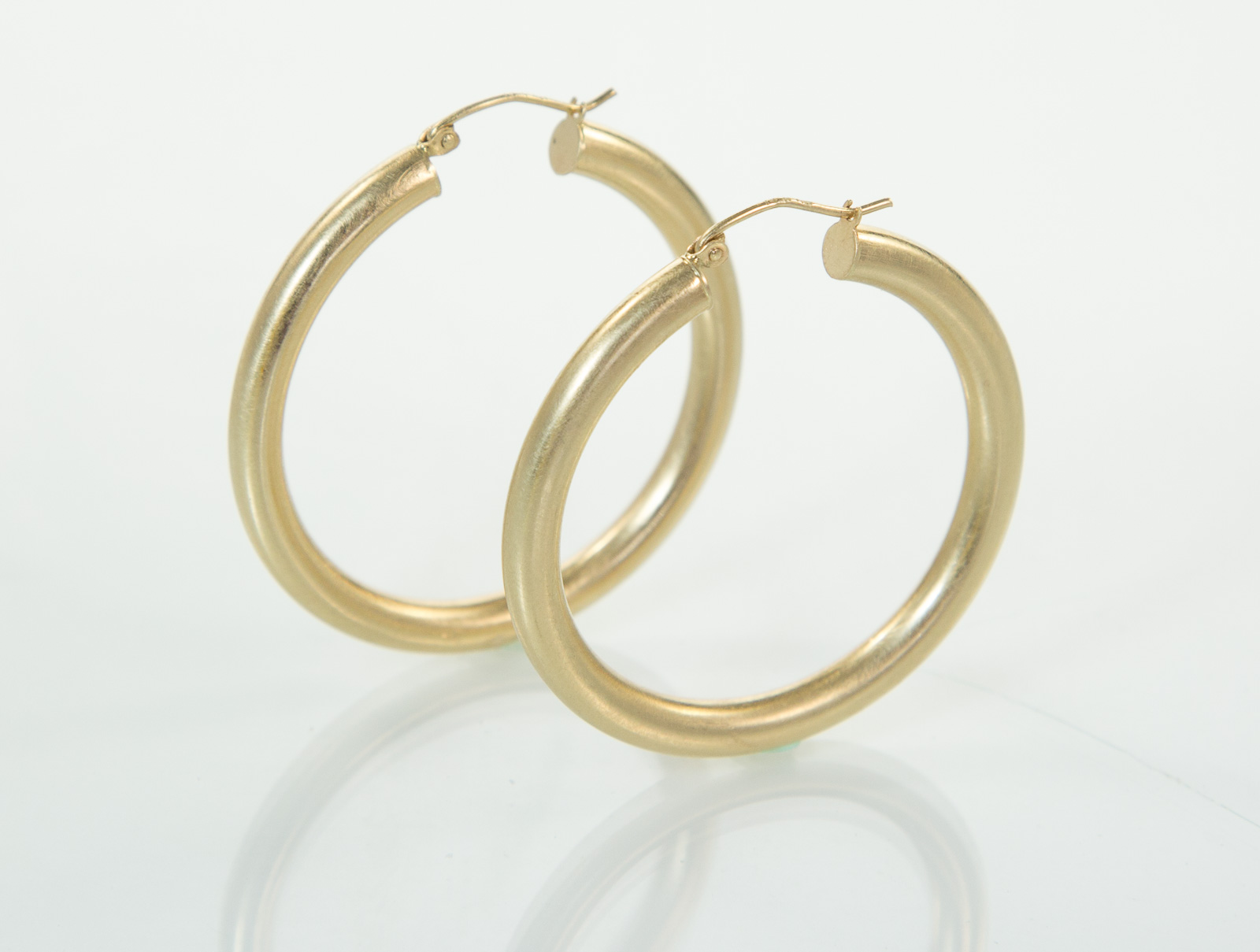 Photo by Robin Smith for Julez Bryant Jewelry. Shot on a dining room table