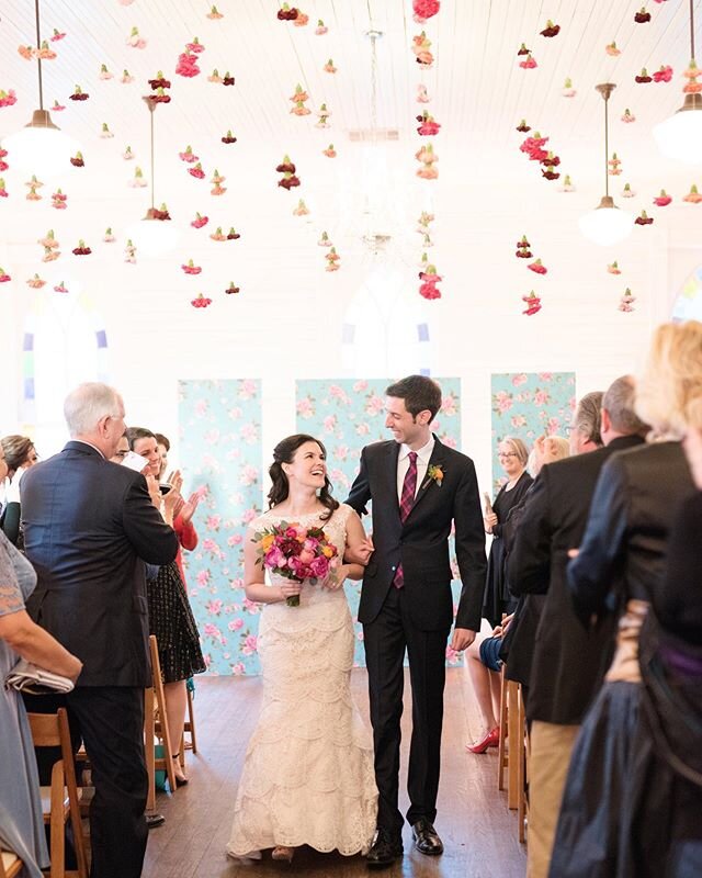 This gorgeous hanging floral instillation hung above this amazing couple as they walked down the aisle. Following the ceremony flip, it was the stunning floral chandelier above their dance floor. I love when floral instillations serve two purposes! ❤