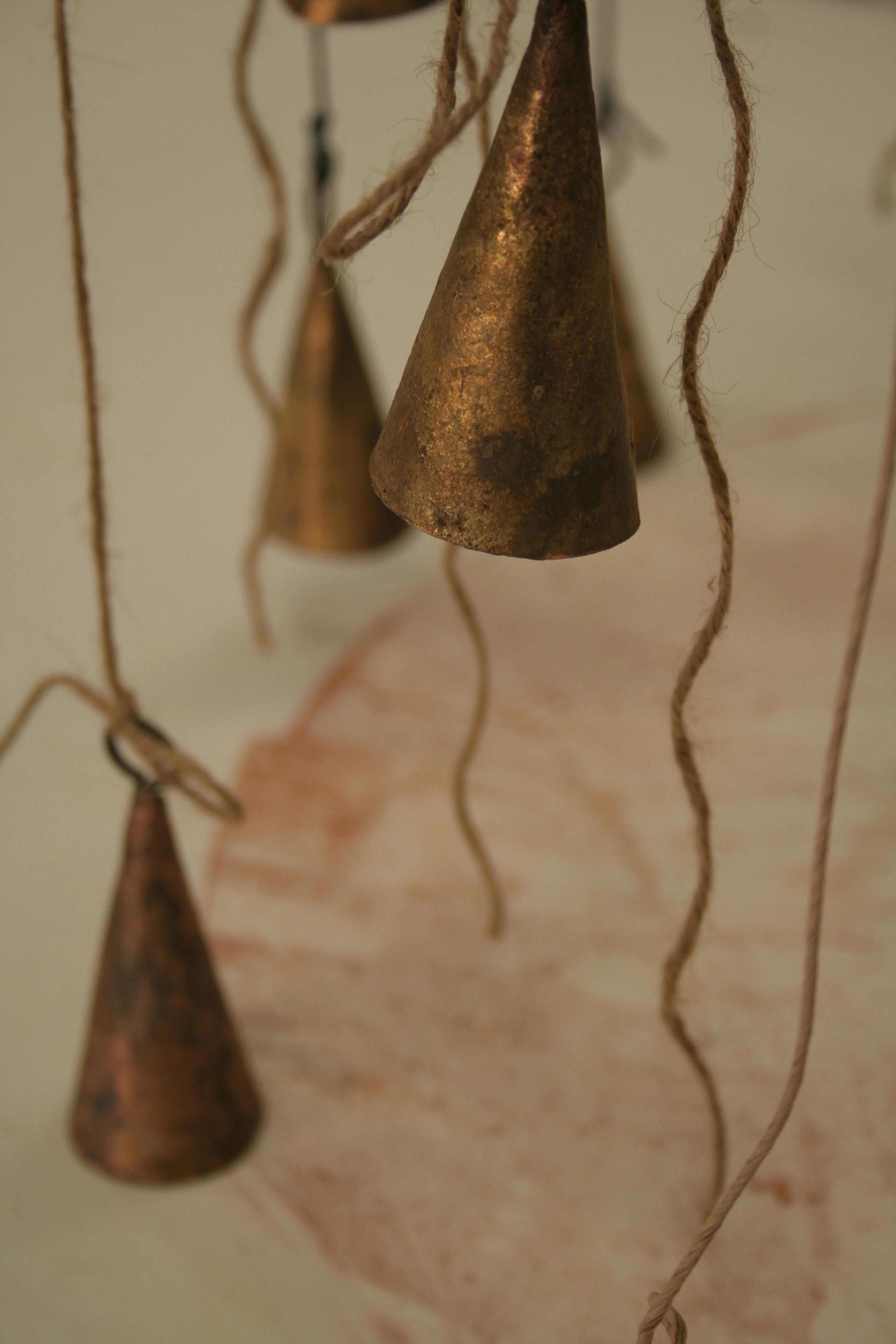  Small Forest Walk, 2014, bells, strings, pigment,&nbsp;24" x 24" x room height 