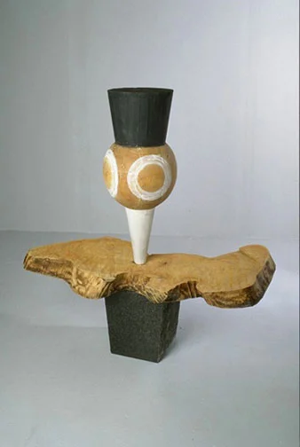 Astron, 1996, wood granite, pigment, 45” x 45” x 21”