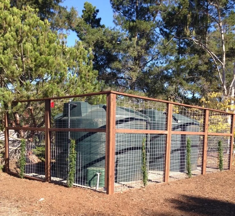 Two 5,000 Gallon Rain Tanks with Vine Trellis
