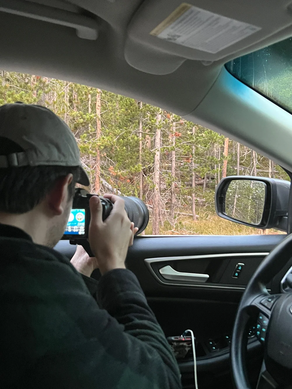 Jorge shooting in the car.jpeg