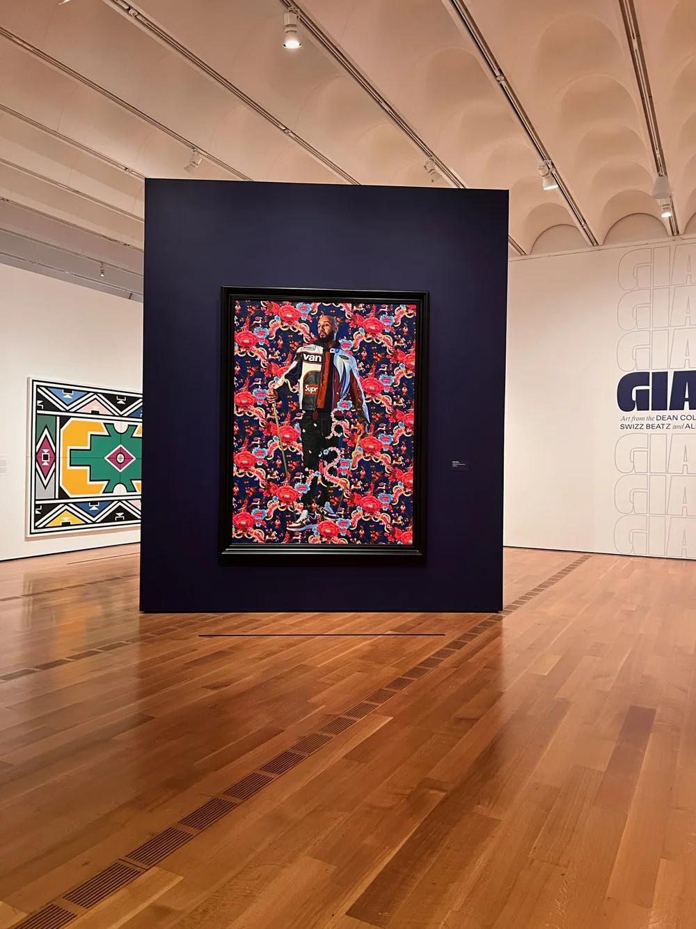  Kehinde Wiley portrait of Swizz Beatz with intricate floral patterns at the High Museum. 