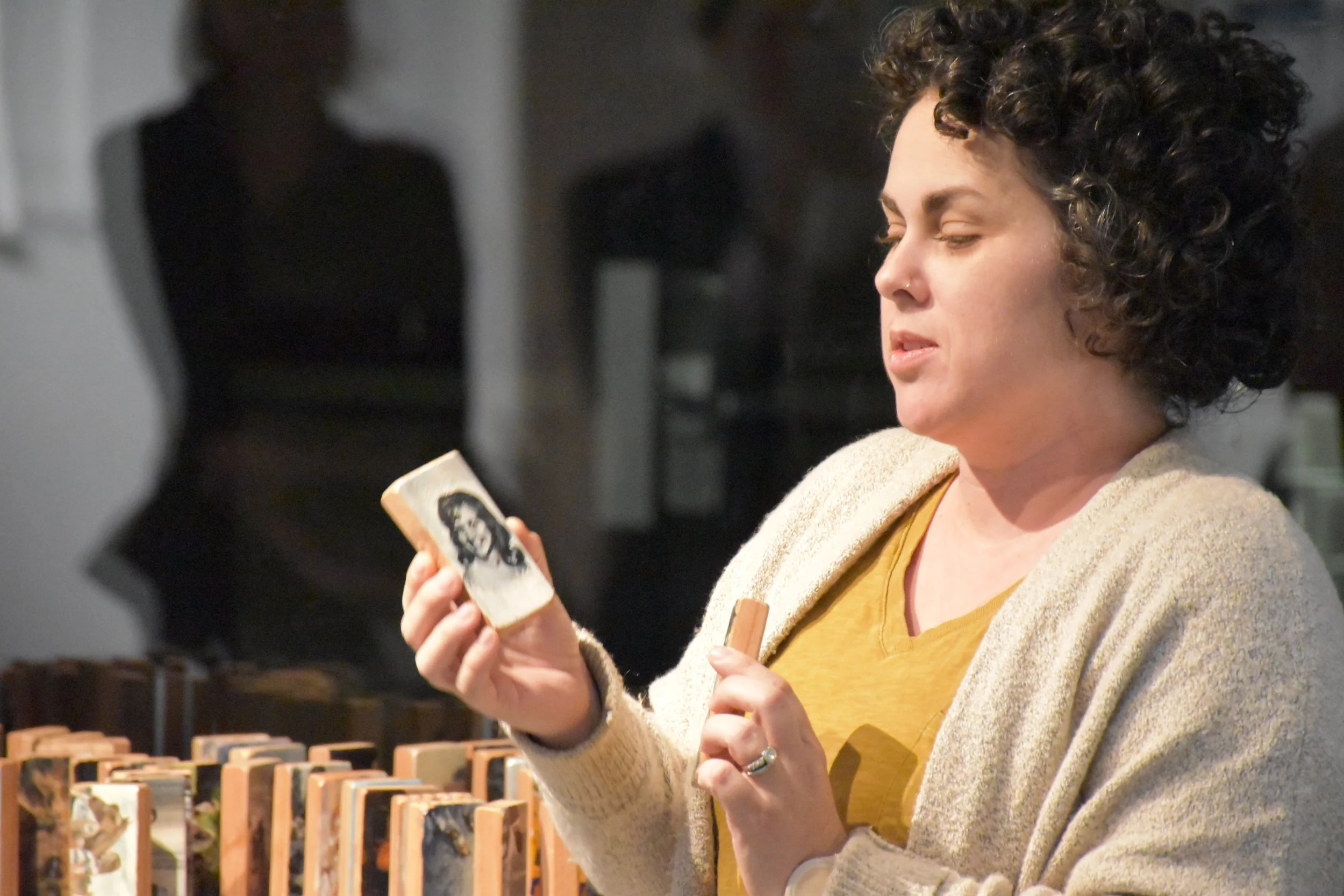 Rachel Hayes sharing her paintings on dominos style blocks