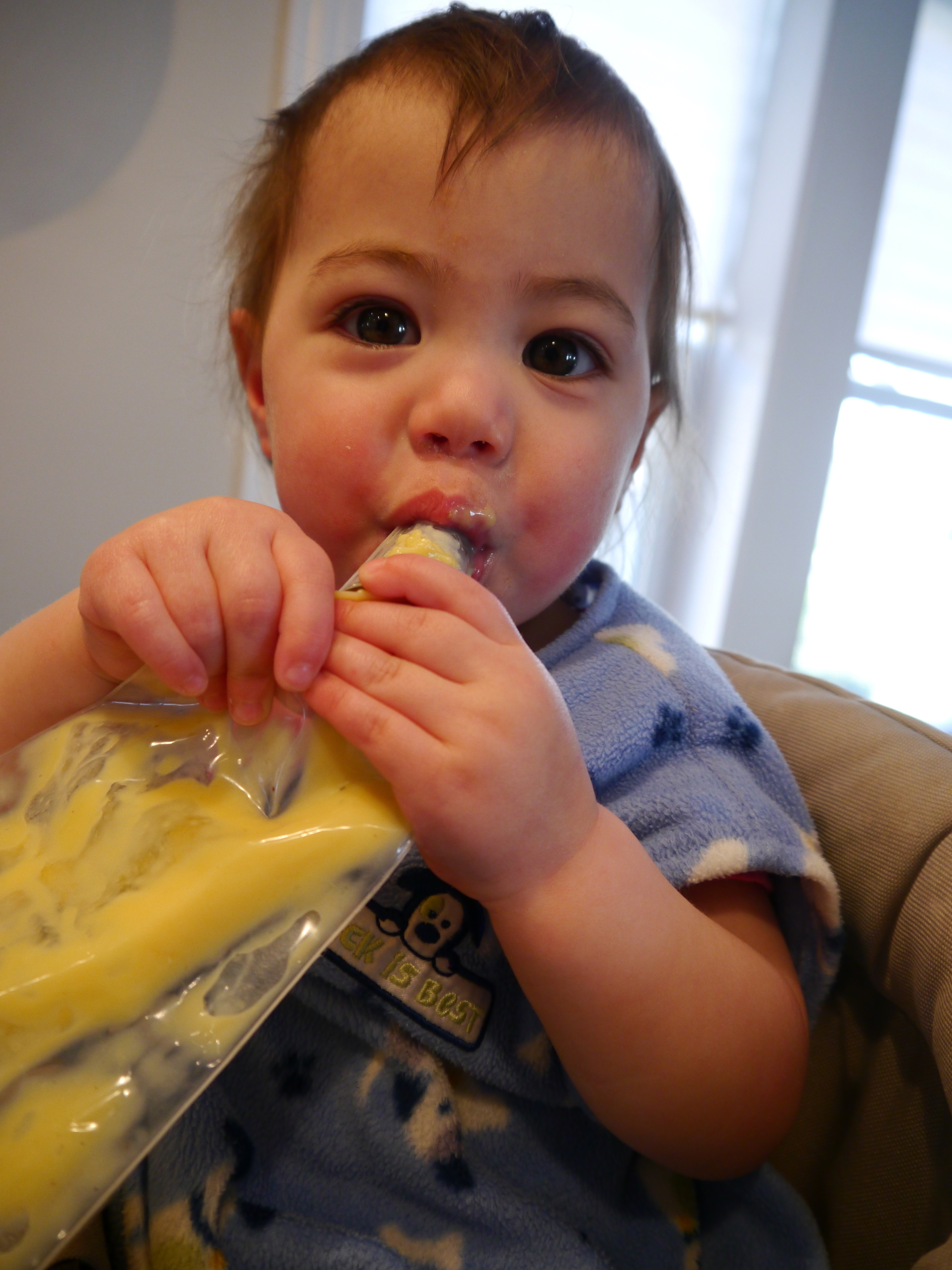 Let your baby suck the extra custard out of the pastry bag to instill an early love of baking.&nbsp;