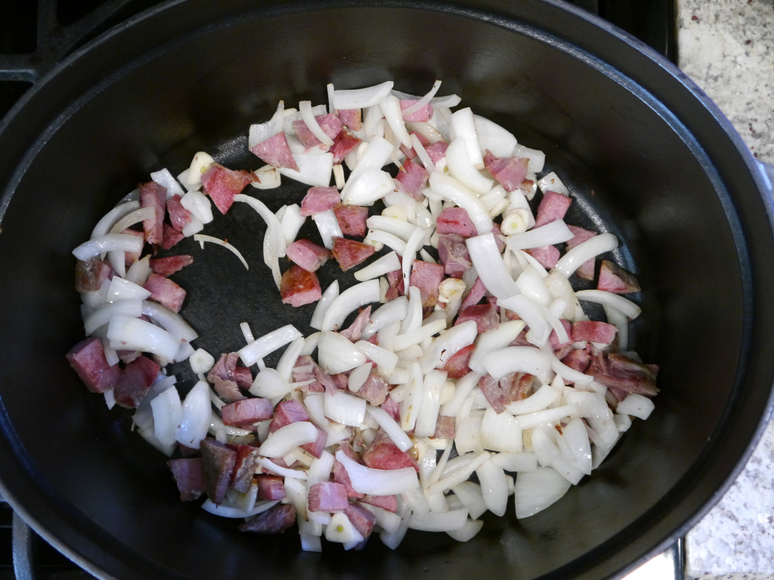 Browning the onions and bacon.
