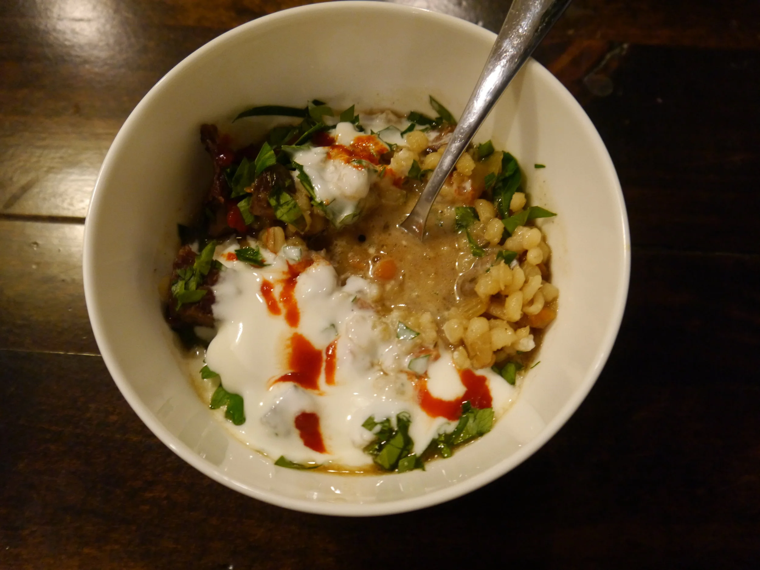 Beef and Barley Soup. I eat all my soup topped with hot sauce, plain yogurt and something green. 