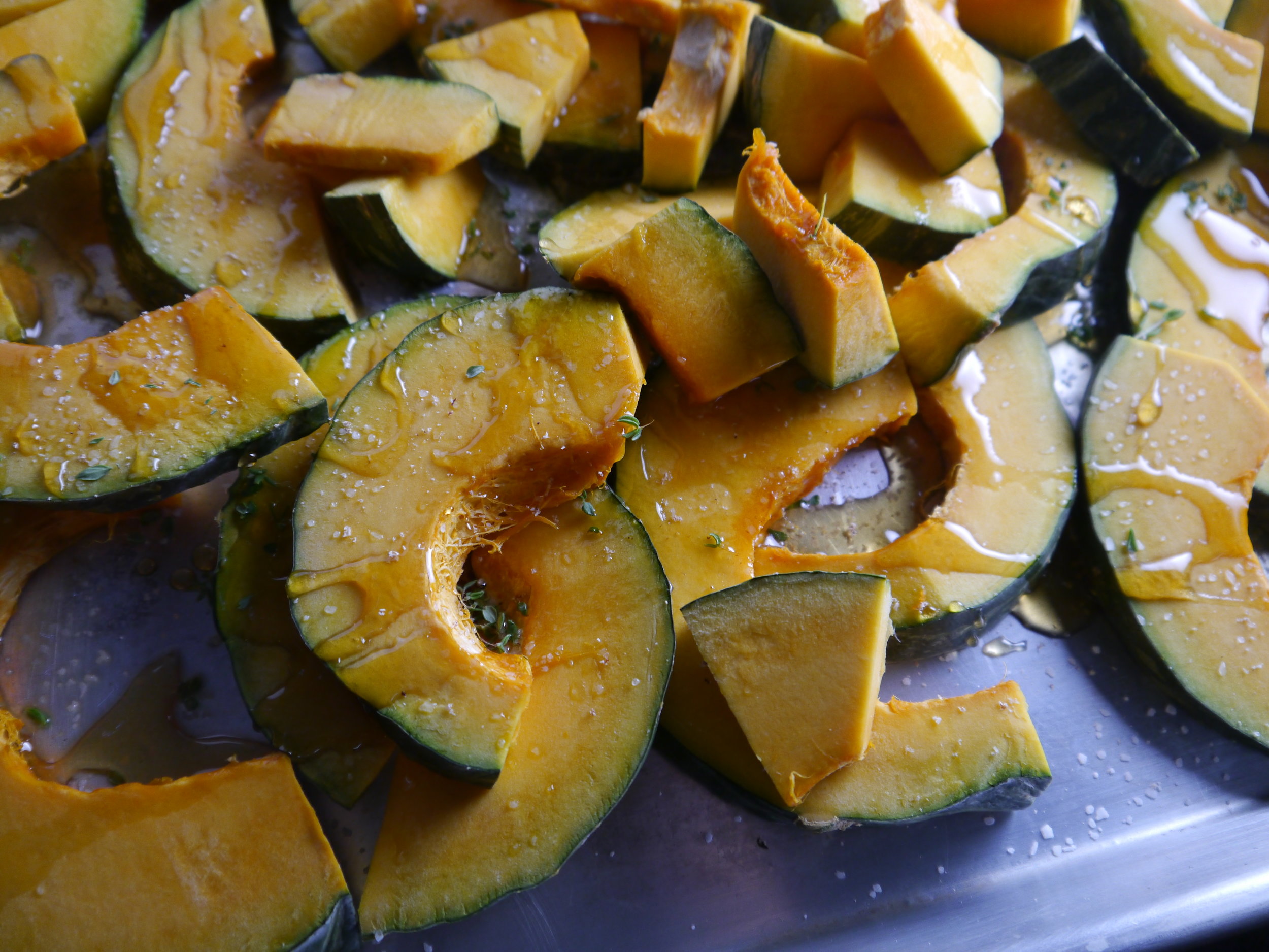 Before mixing the slices up on the tray to make sure they are evenly coated. 