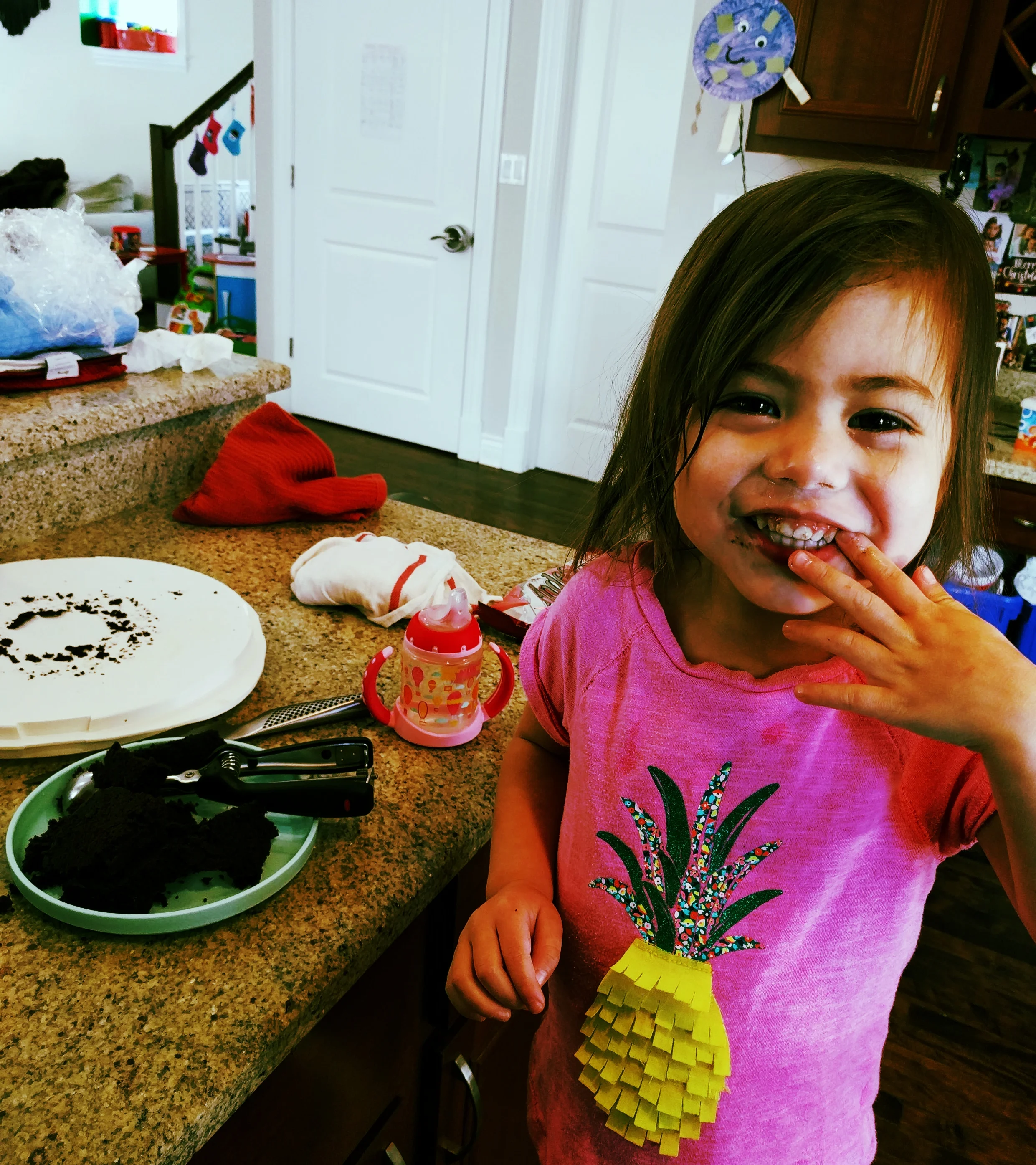  This one helped, and by “helped” I mean, helped eat the cake that I cut out to make room for the filling.