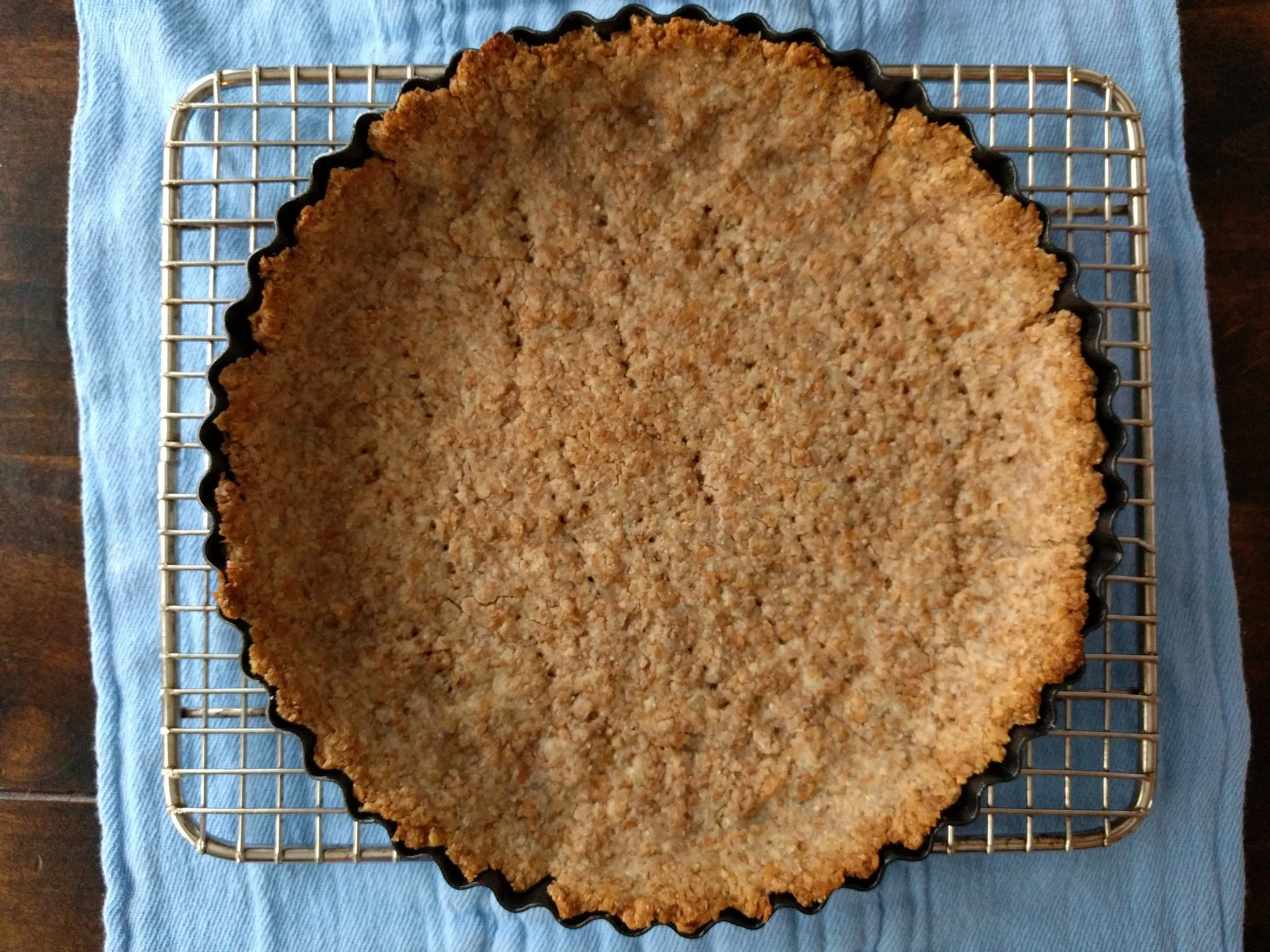 Blind baked. I couldn't wait for this to cool. Probably not a good idea to start cooking projects when starving. 