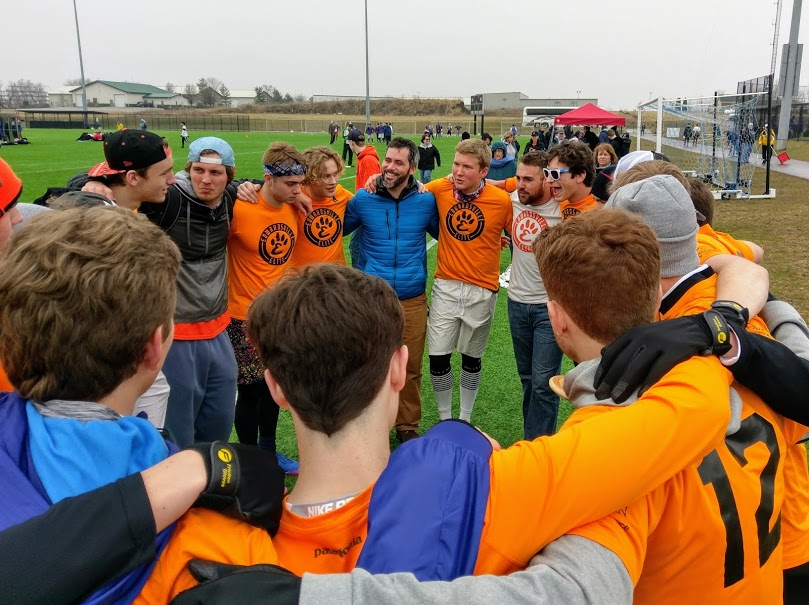 Andy Neilsen celebrates with the Edwardsville Elite HS Boys team after winning finals (initially seeded 10th of 10 teams). 