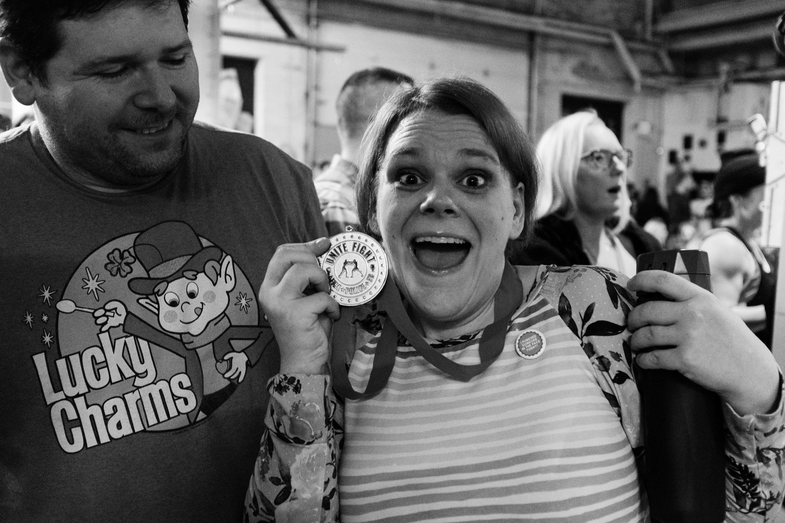 Irish Frisky With her Unite and Fight Medal. Her Button reads-”I punched someone in the face today!”