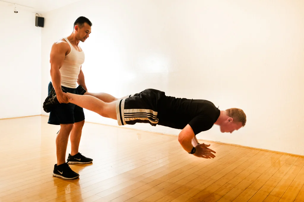 Brian Holding Scott for poly pushups.jpg