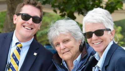 Sheila Parker Tolle (right) officiating a USRowing regatta.