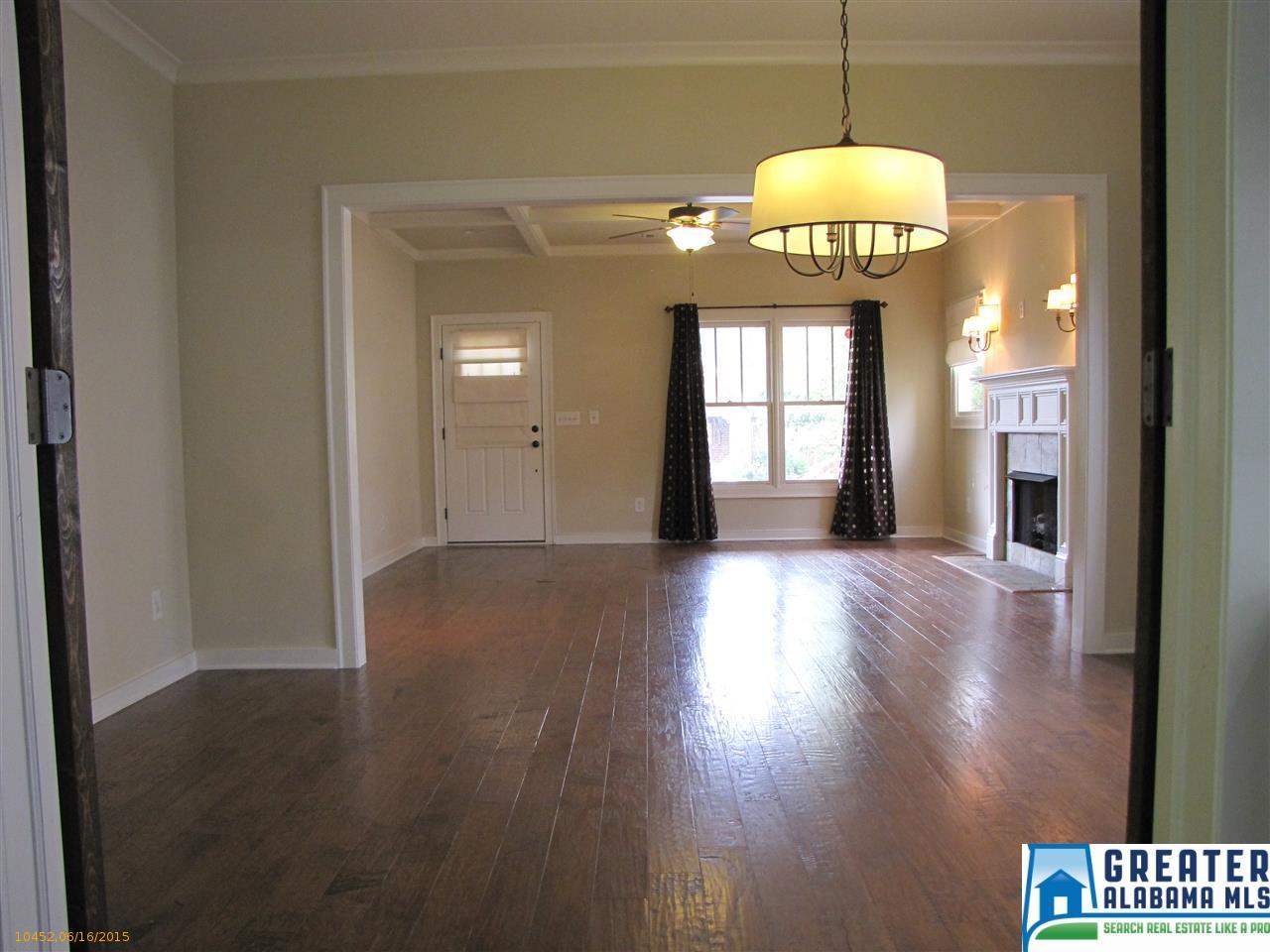 BEFORE - Agent photo of dining/living room
