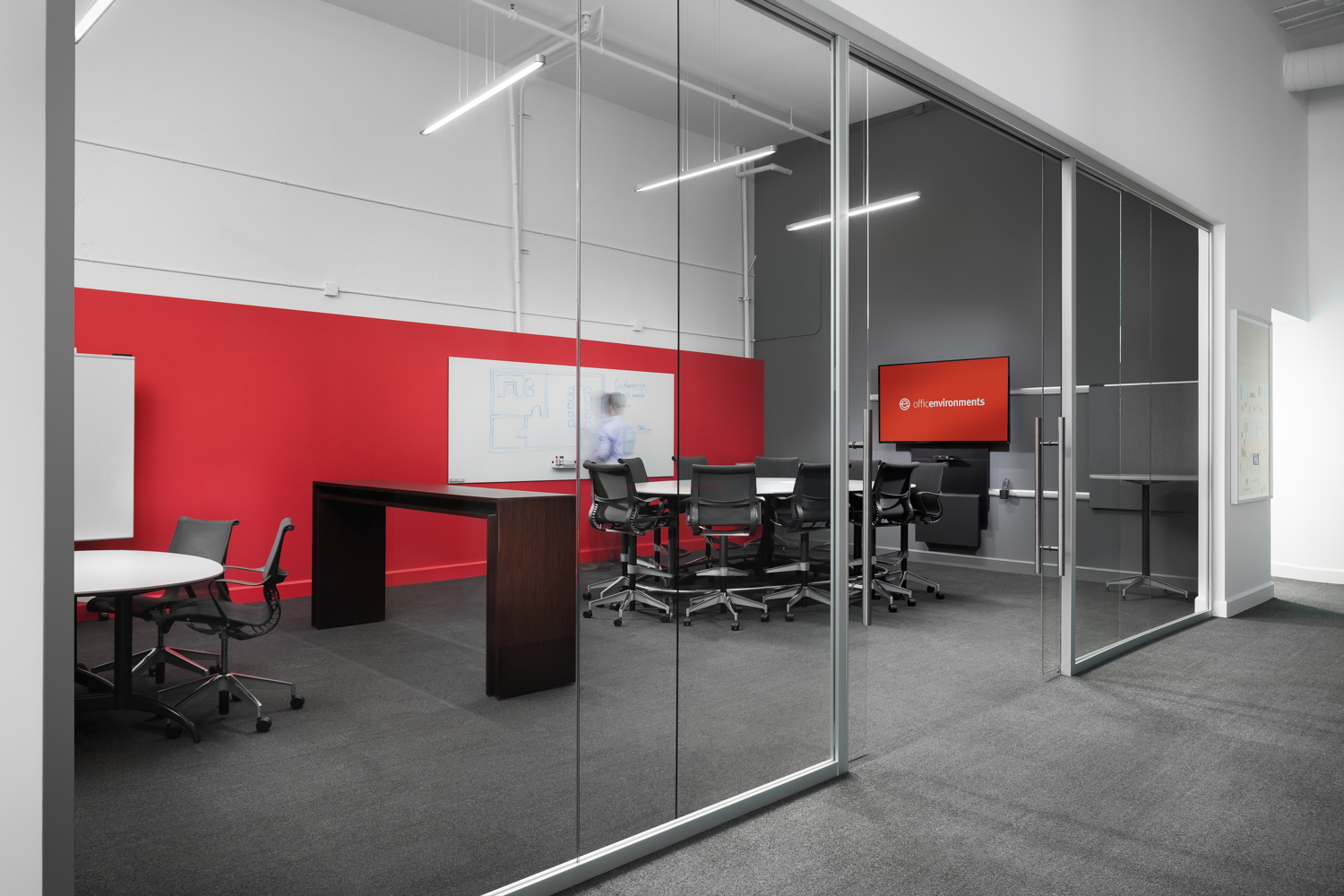 Click on image to view larger - Conference room at Office Environments in Birmingham. This shot was particularly difficult due to the large windows and all the reflections in them. I utilized several techniques to control them. The final image is a combination of multiple ambient and strobe exposures.