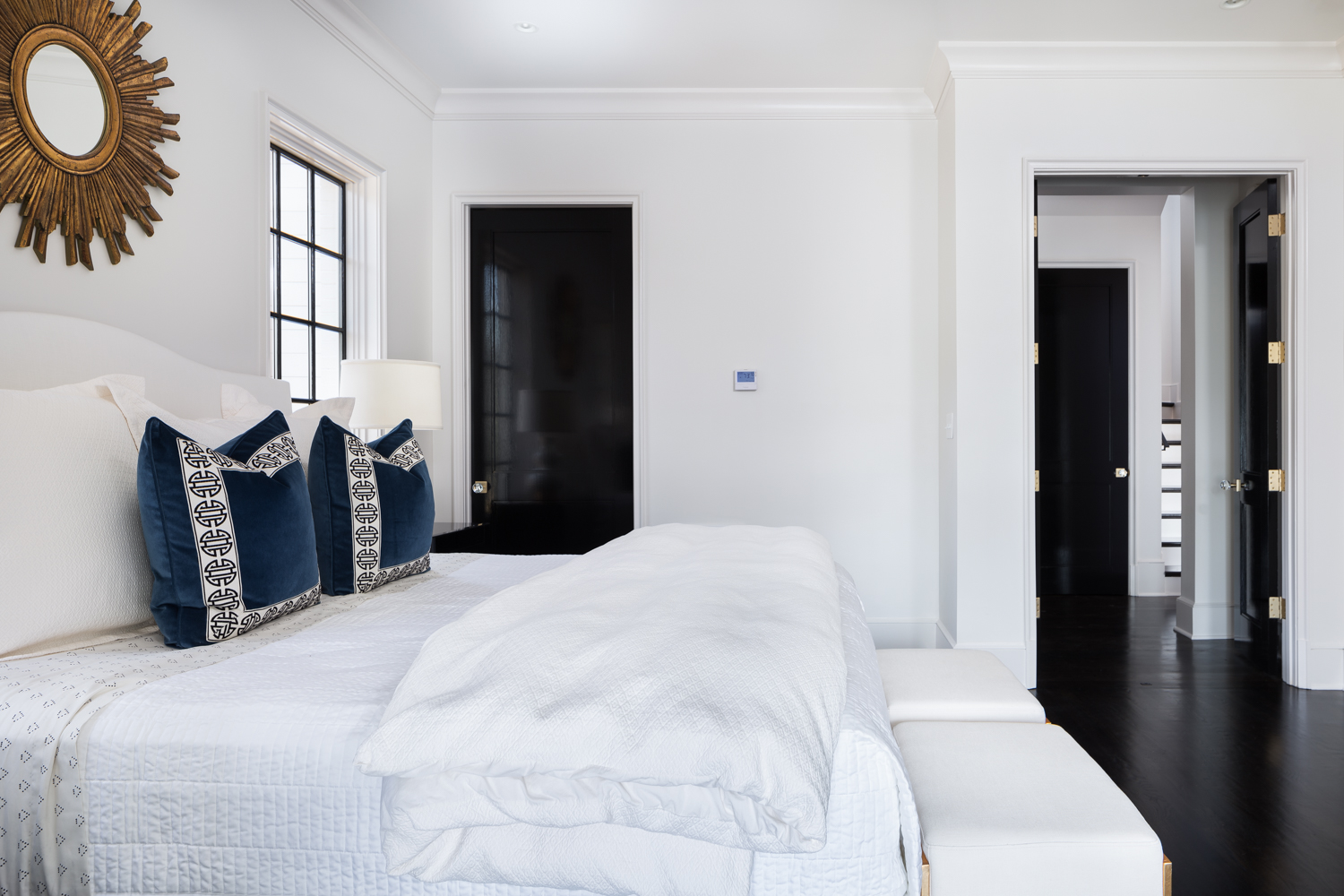 White bedroom with black trim