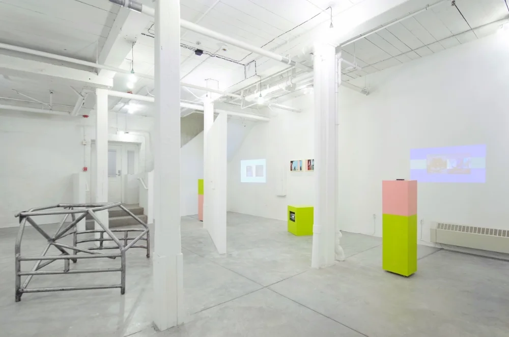 Again Again is the first installment of a two-part exhibition focused on subtle, persistent revolt. Through the implementation of pale, muted, and pastel colors the artists reference the mundane aesthetic commonly associated with necktie collections, tupperware parties, office climate or holiday decorations. These interdisciplinary works feel familiar and reveal an underhanded, yet delightful rebellion upon continued investigation. By splitting the exhibition into two parts, curators Corey Oberlander and Lindsey Stapleton are able to explore two separate manifestations: the mental and the physical rejection of domestic urbanity. A two-person exhibition with Ross Normandin and Clark Mclean Graham, Again Again focuses on the mental and subconscious day-to-day dissatisfaction. Moving through personal achievement, memory and experience, the work will be hung tightly together, forcing the viewer to experiences the full collections oF work at once, or not at all. Pleasing but uncomfortable, the works here will not allow the viewer to feel complacent, and instead illicit surprising emotions despite muted pastel colors and soft installation techniques. High and low chroma; side-by-side and vis-à-vis, the installation of Again Again will focus on a repetition, subtle deviation and persistent effort. In dialogue independently and cohesively, both artists reject the fully mundane - choosing instead to highlight and examine tiny moments of common experience, failure and triumph.