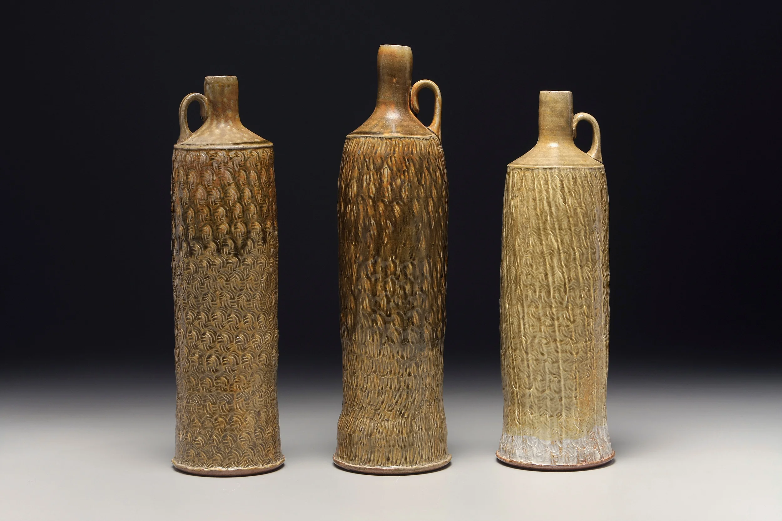 3 textured bottles.jpg