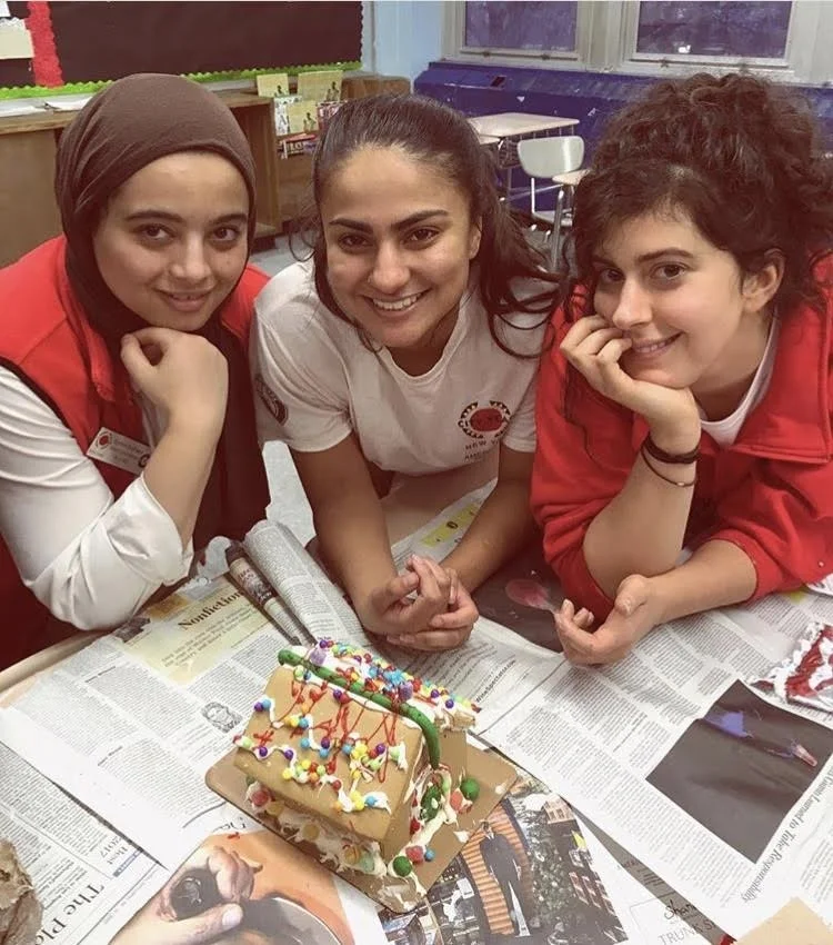 We made gingerbread houses with our kids during our After School program around holiday time. It was a freaking mess and I can never look at frosting ever again, but it was really fun.