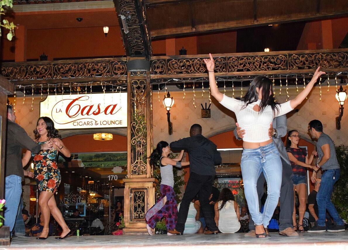 Guests dancing to salsa music at La Casa Cigars & Lounge in Summerlin