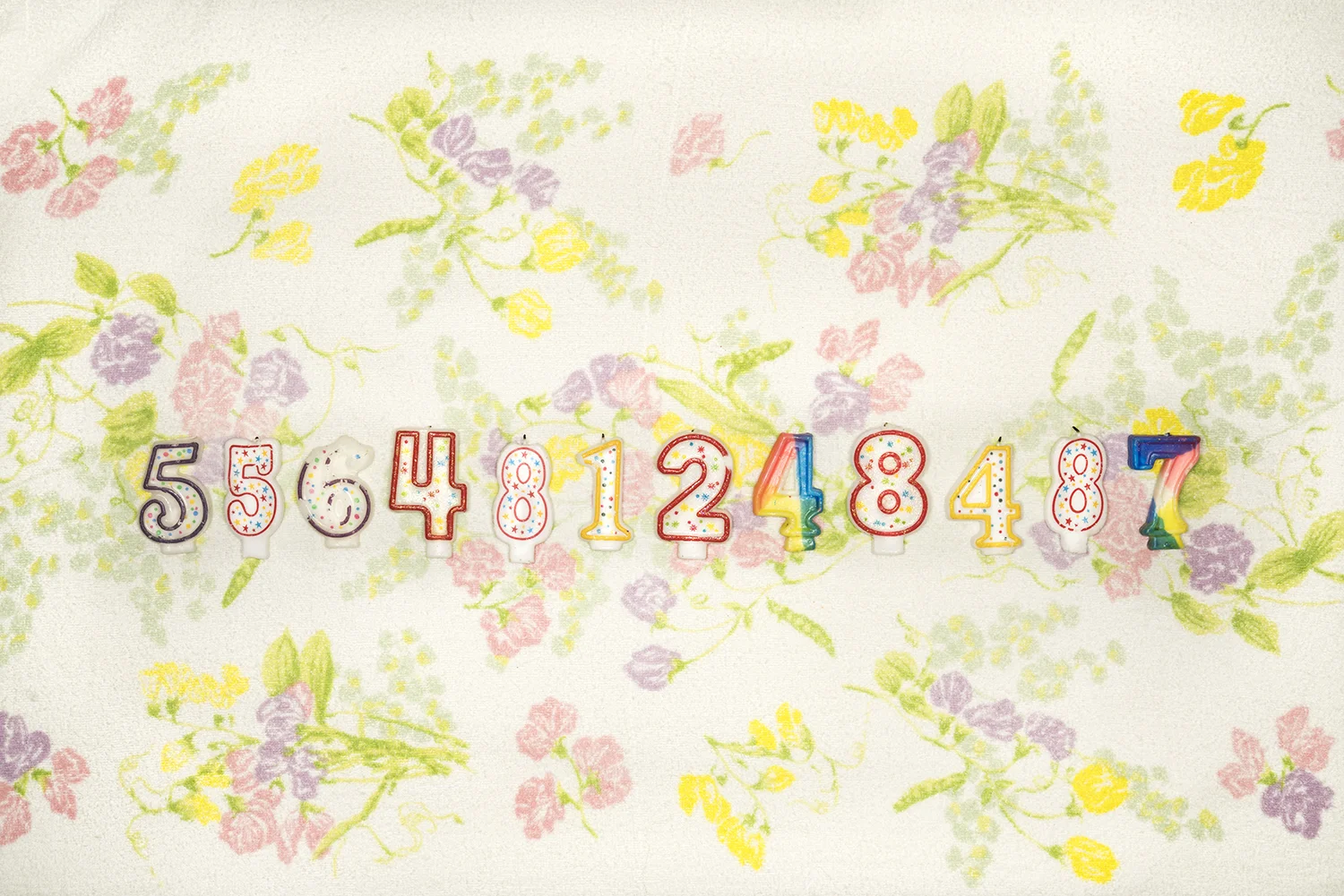 Reused Birthday Candles on Floral Dish Towel