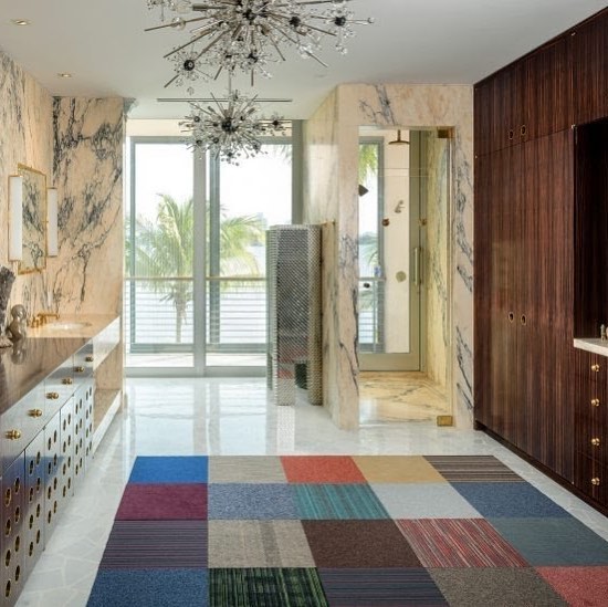 Custom French Polish Macassar Ebony bathroom vanity and closet with custom brass rings designed by @frankdebiasi featured in @dezeen manufactured and installed by #byblosgroup. Article: https://www.dezeen.com/2018/12/21/shulman-associates-lindemann-h