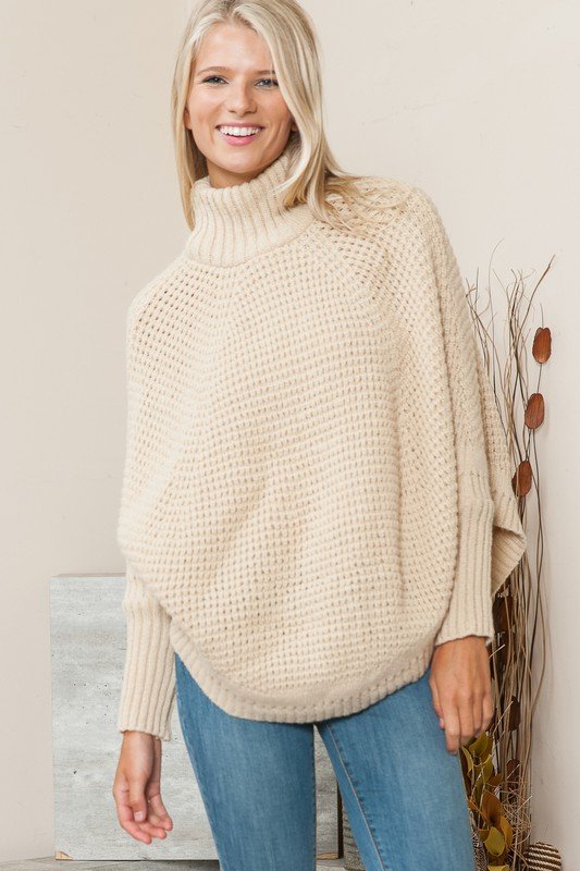 Brigitta Cable Knit Poncho Sweater — Yellow BoutiqueNew ArrivalsBrigitta  Cable Knit Poncho Sweater