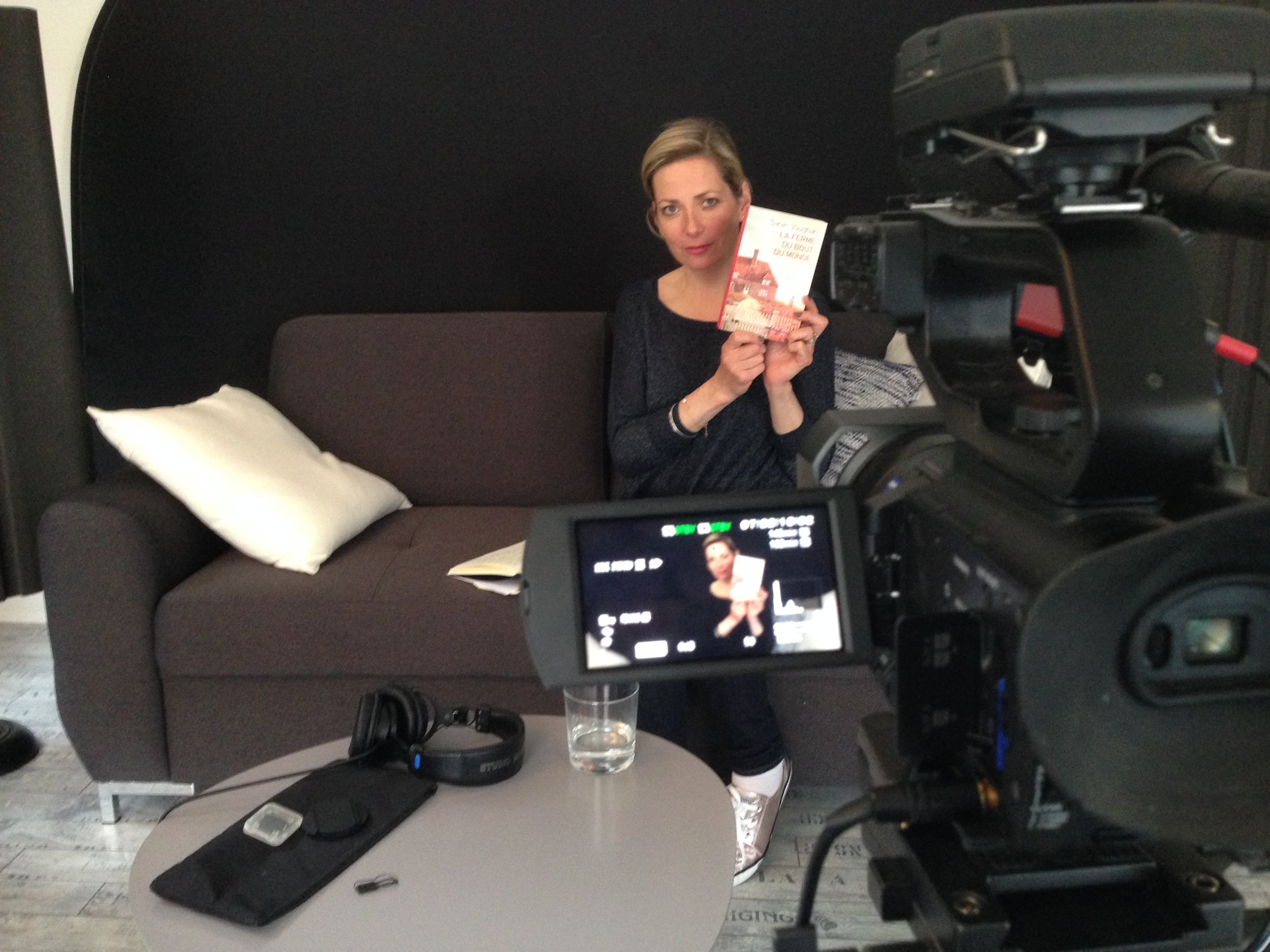Being filmed discussing La Ferme du Bout du Monde.