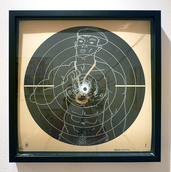Boys Never Fail 5 (2010) Ink on Norwegian shooting target paper, museum black box frame with laminate glass. Shot once through with a 9mm handgun 25” x 25"