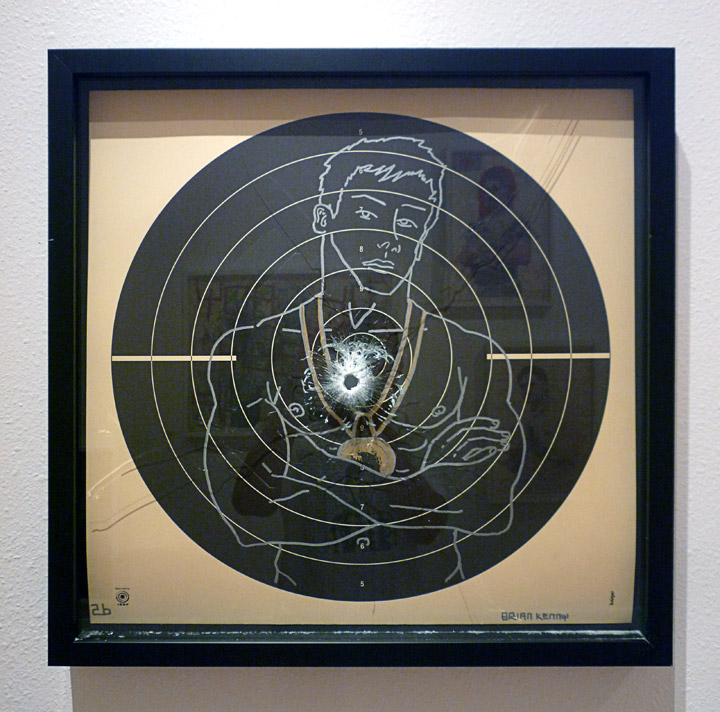 Boys Never Fail 2 (2010) Ink on Norwegian shooting target paper, museum black box frame with laminate glass. Shot once through with a 9mm handgun 25” x 25" ( private collection )