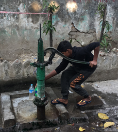 Boy at Calcutta pump, 2018