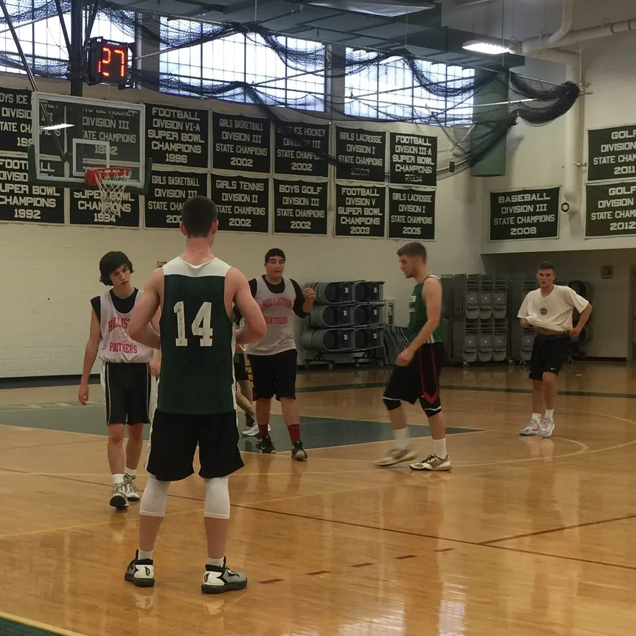 Westwood's Aidan Fitzgibbon (#14) running out the clock for the win over rival Holliston. 