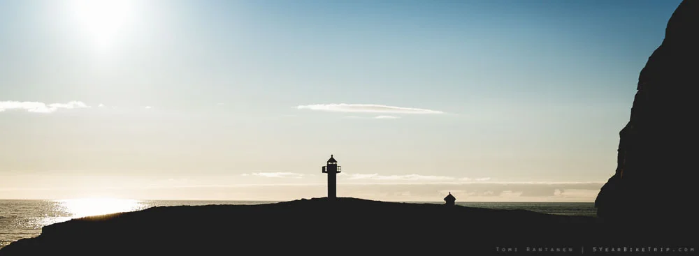 Lighthouse silhouette in Norway.