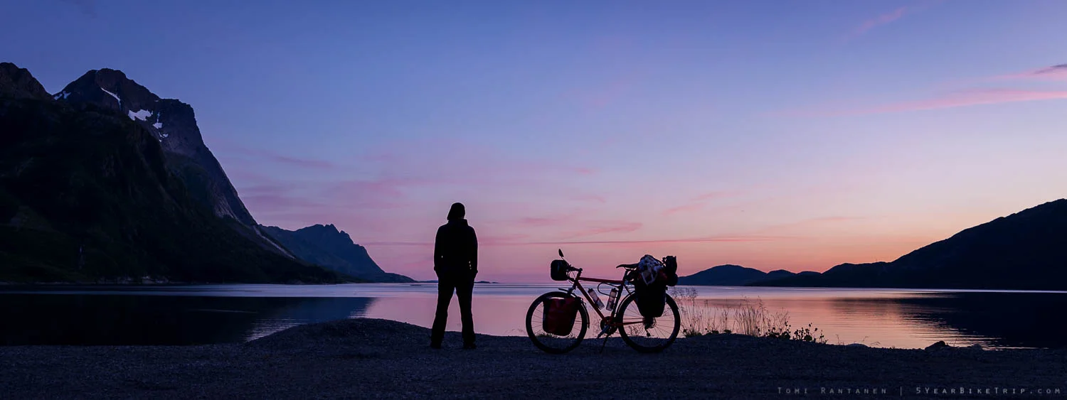 Bicycle tourer at sunset.