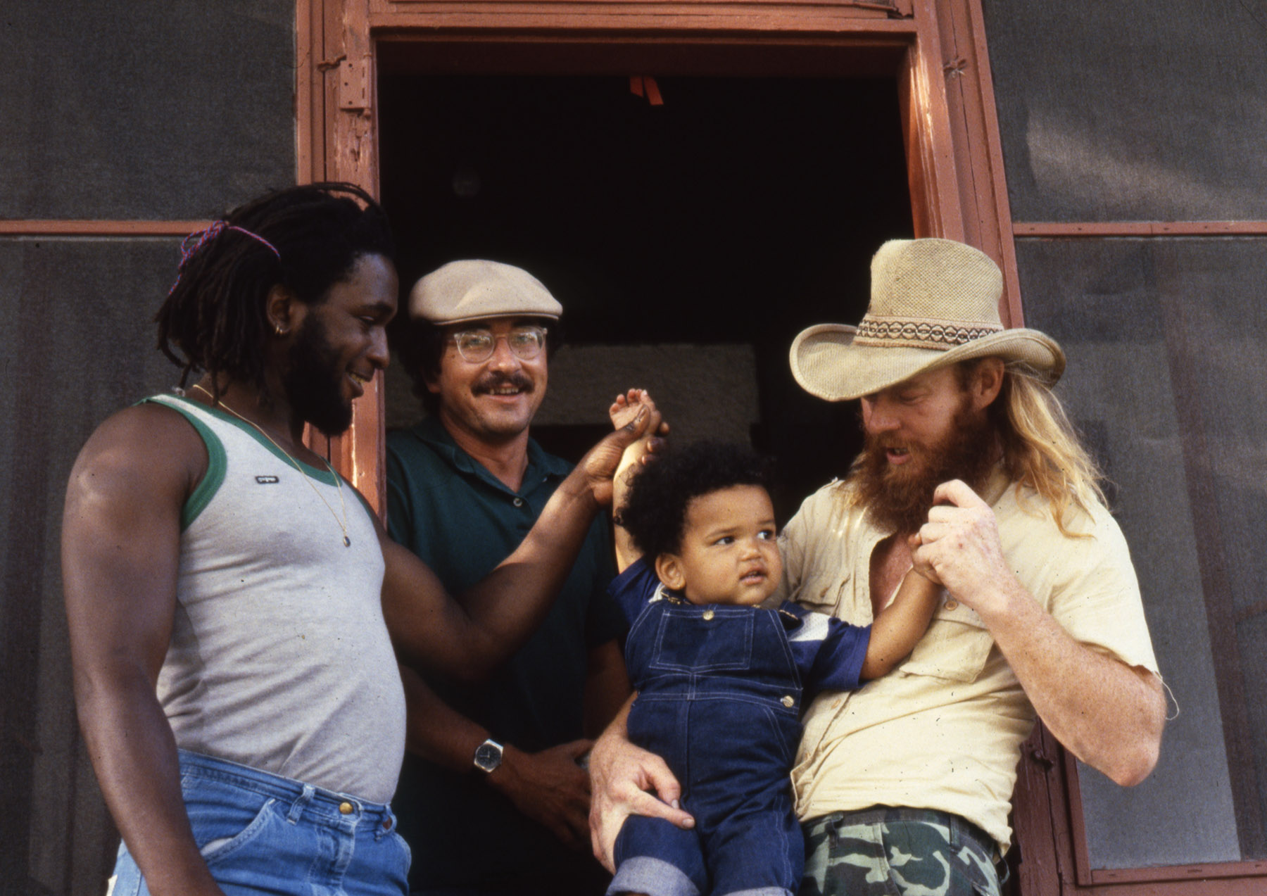  "Mark, in the golf hat, was a neighbor of mine in Minneapolis, and Brian, in the cowboy hat, was a friend of Becky's" 