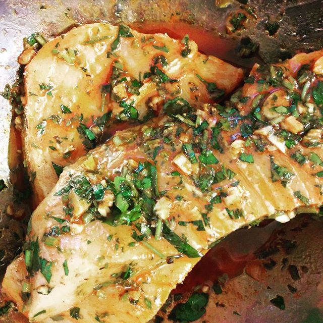 Argentinian style sword fish marinated in Chimichuri - parsley, garlic, salt, pepper, olive oil, lemon and paprika.
