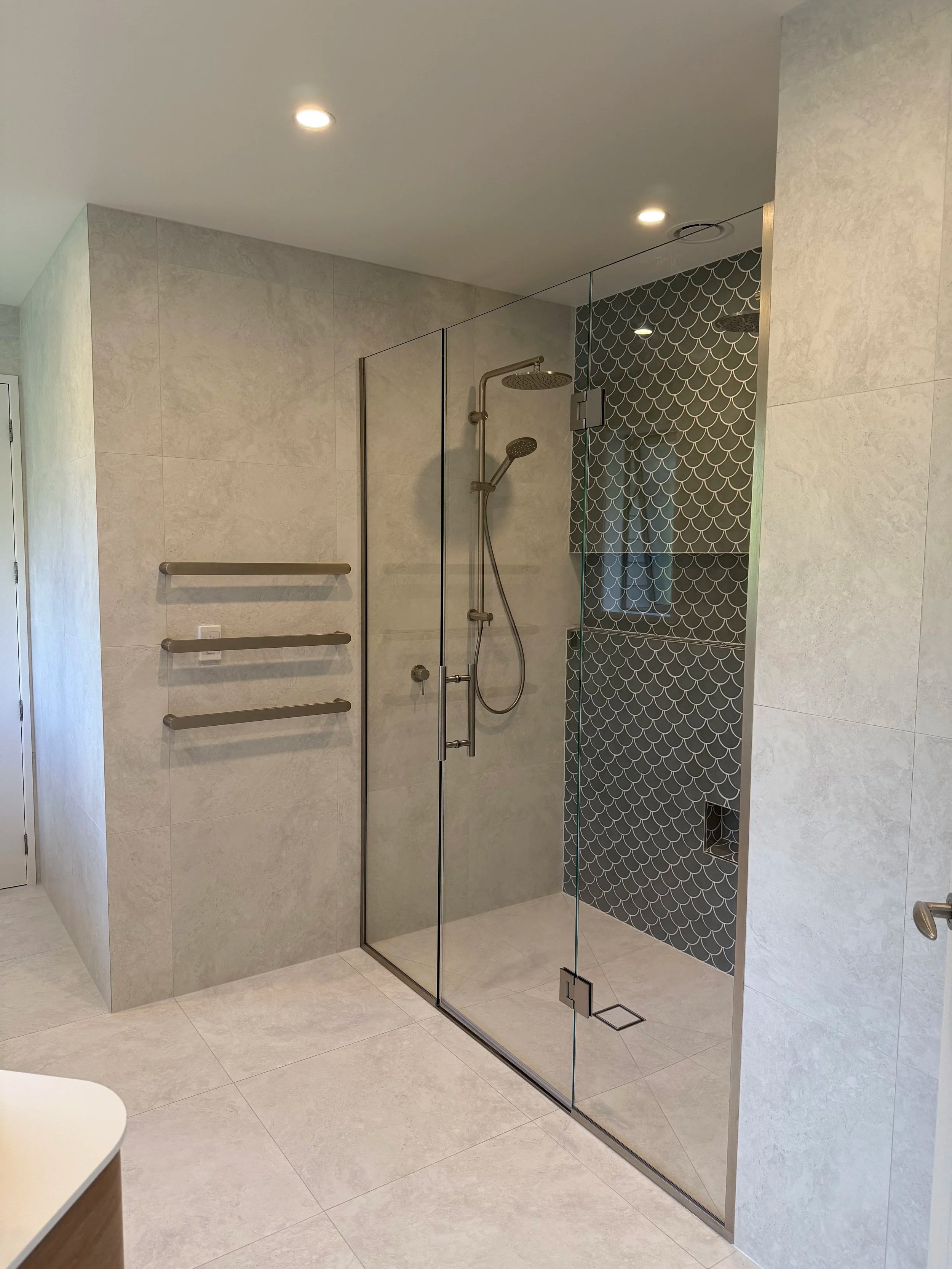 Bathroom with tiled shower