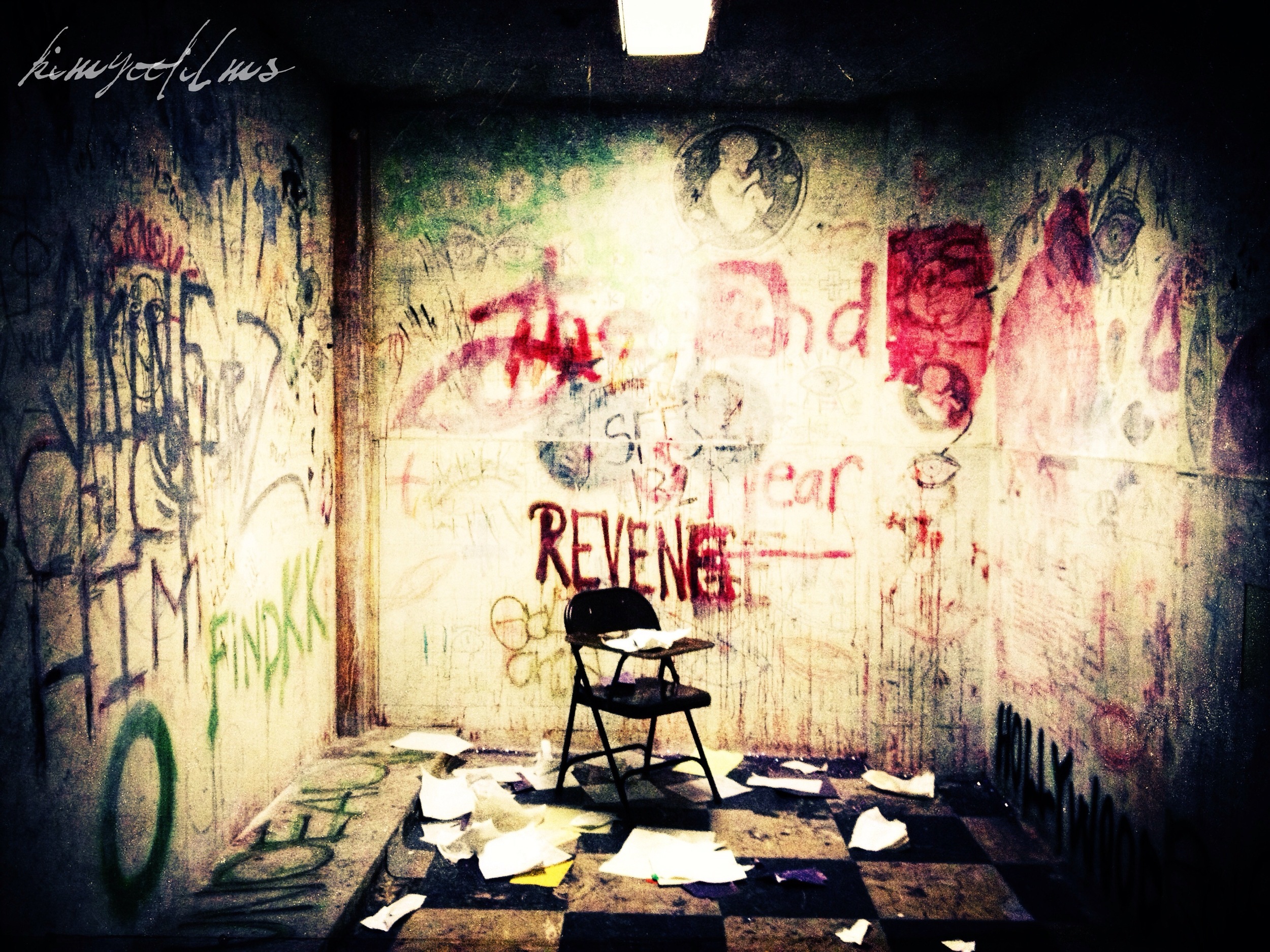 Creepy graffiti room.