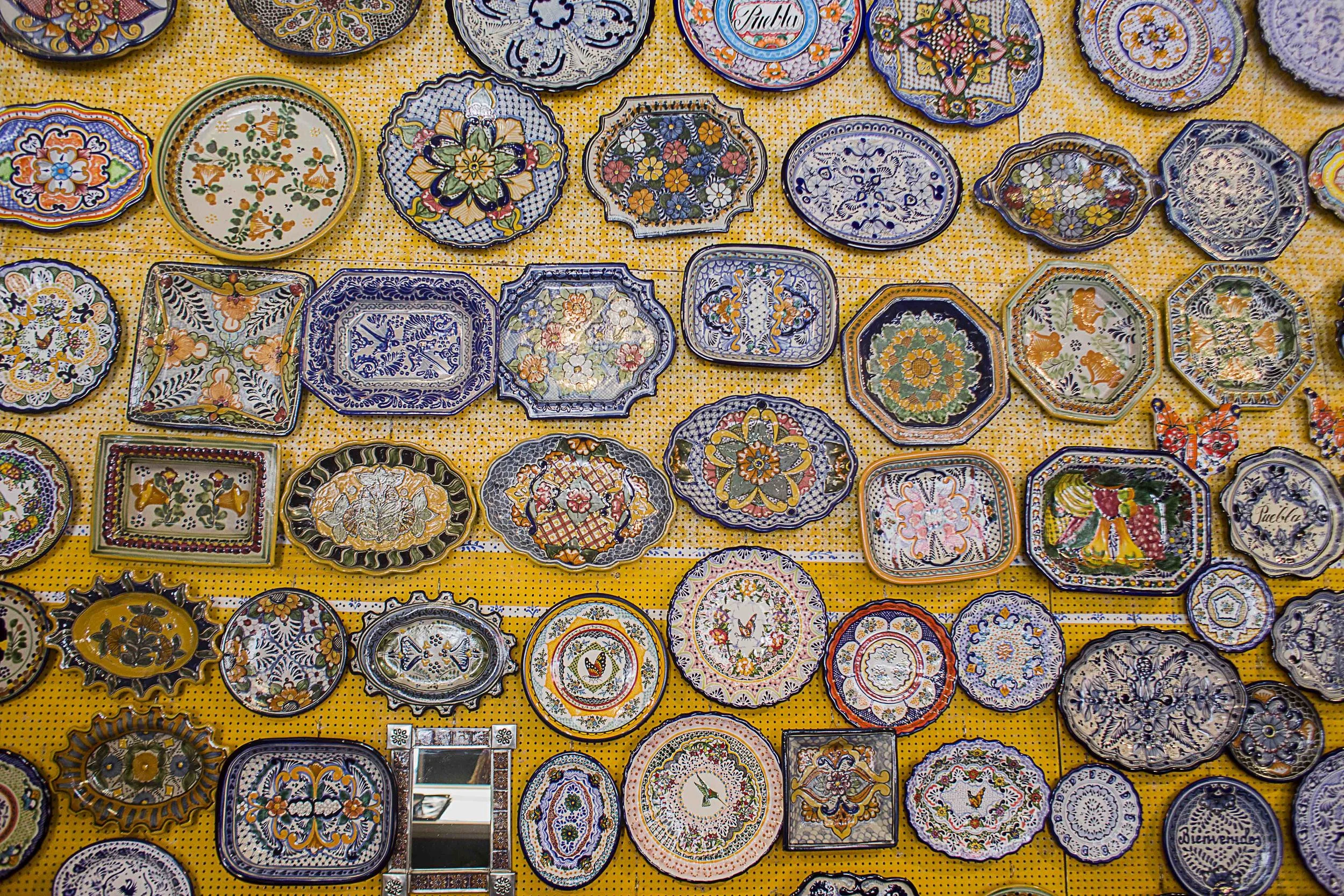 Day 99 - Puebla, Puebla, Mexico A Talavera shop showcasing their many plates and designs.