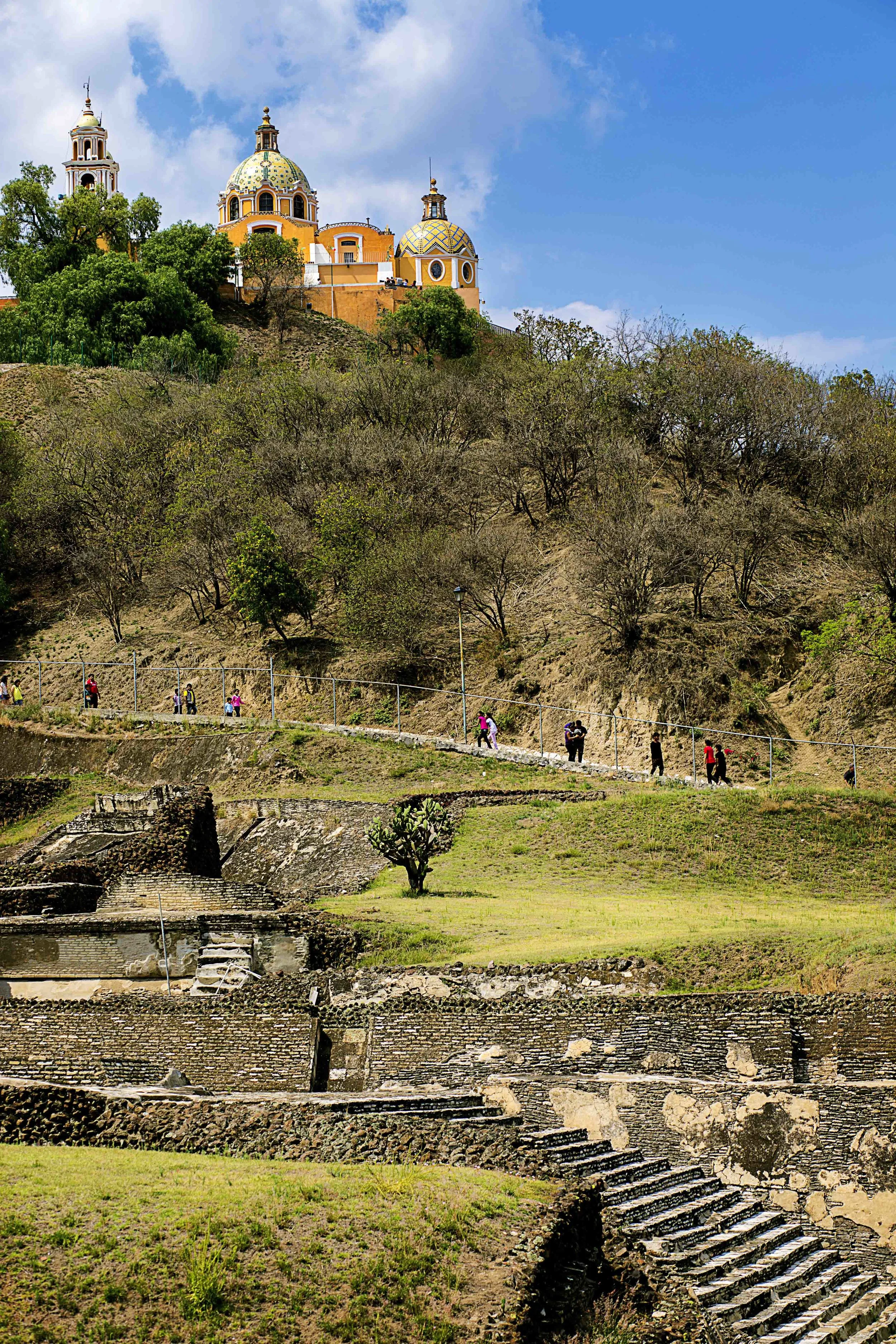 Day 100 - Cholula, Puebla, Mexico As Cortez made his way to Tenochtitlan during his conquest, he stopped in the very important trading city of Cholula where it's main pyramid was destroyed and a church was erected in it's place. Its remains still stand and only a portion of it has been excavated. It is the largest pyramid by volume in the Americas, so large that tunnels have been found underneath. 