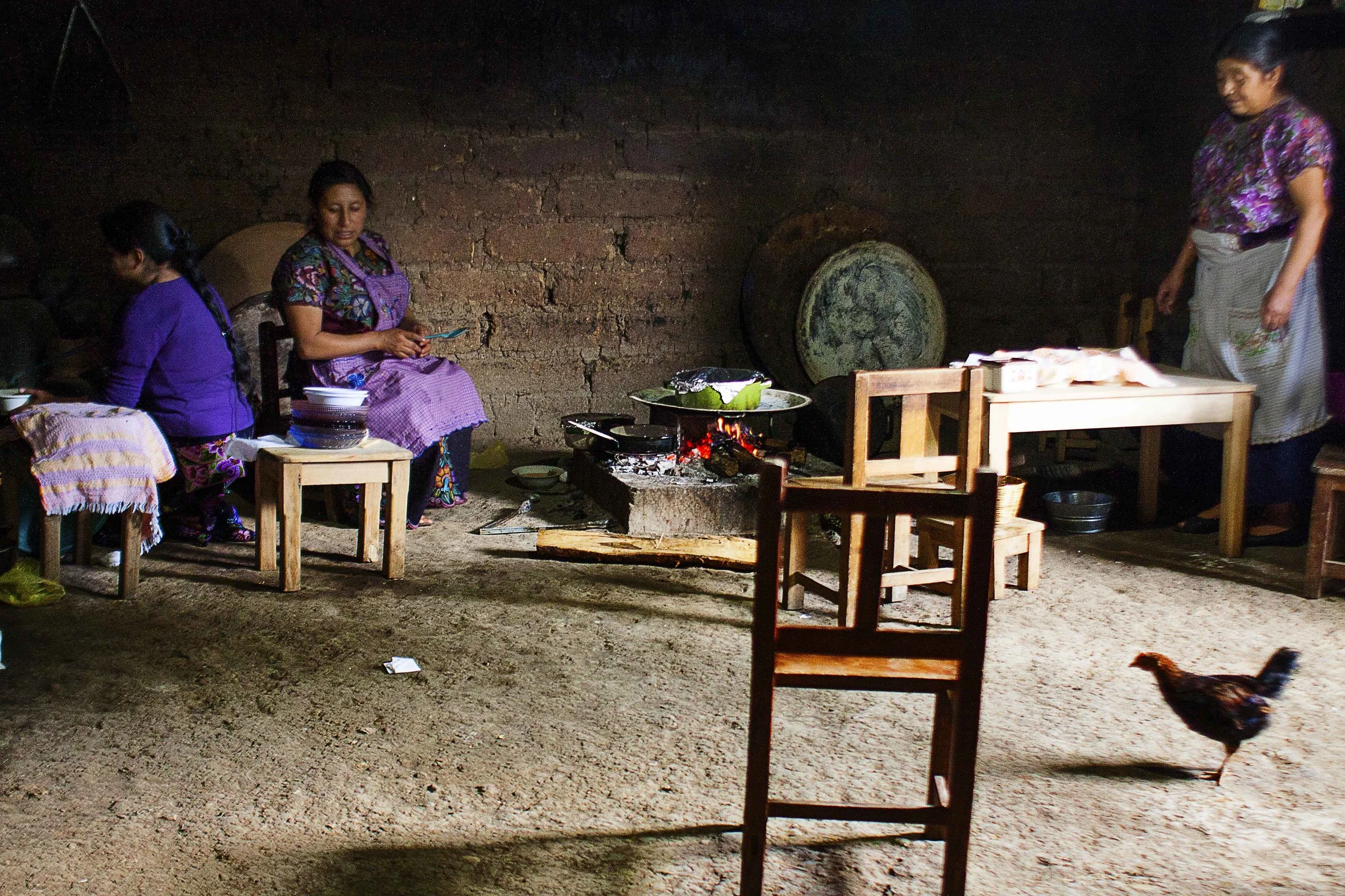 Day 125 - Zinacantán, Chiapas, Mexico An indigenous community near San Cristobal where we were invited for a delicious lunch made in a traditional kitchen inside an adobe house. It was the perfect temperature inside despite the heat from the stove or outside. The women of the house all helped with making chile relleno, chicken soup and fresh tortillas for us. All from fresh ingredients grown in the area -- including the chicken!