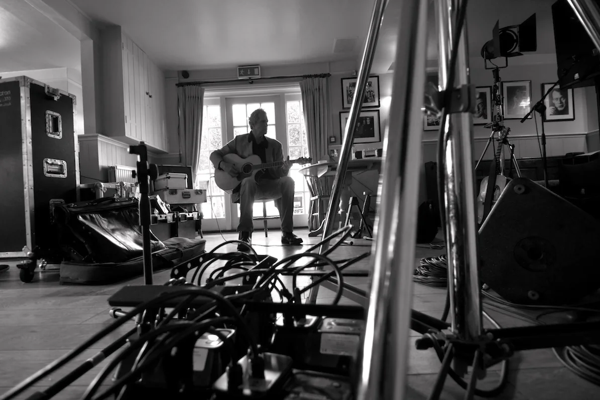 John tunes up in The East End Arms, his New Forest Pub. 2014.