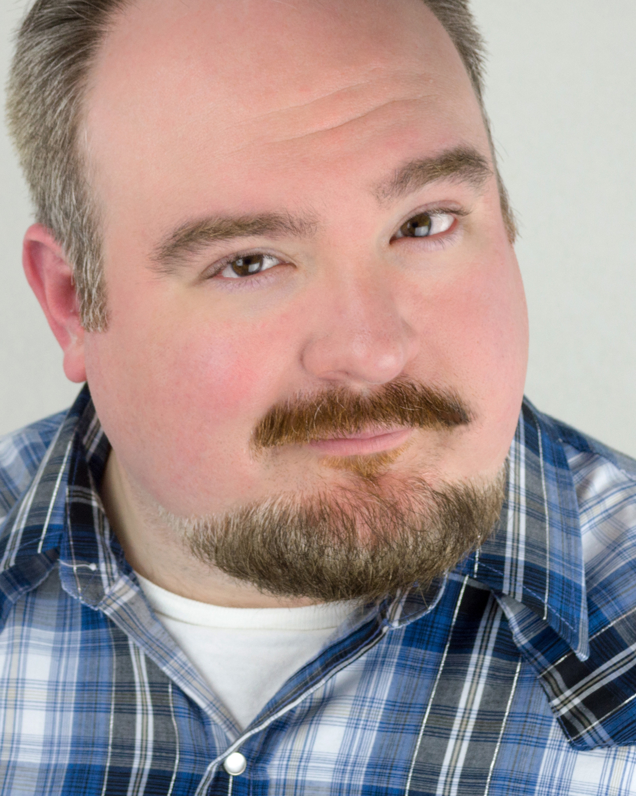Brad McEntire’s plays have been described as “kitsch with significance.” They often feature strange situations, misfit charcaters and quirky humor. Three of his short plays,  I Brought Home a Chupacabra, Dinosaur and Robot Stop a Train a nd  Raspberry Fizz  are published through Dribble Funk Books and are available on Amazon.com. He is also the author of the comics collection  I Hate Hawk Season . He is a satellite member of The Playwright's Center in Minneapolis, part of the New Play Exchange online and has studied playwriting with Will Power as part of the Dallas Playwrights Workshop at Southern Methodist University. In 2015, McEntire served as the first theatre-artist-in-residence at the Kathy George Indie Artist Residency in Ashford, Oregon. Recently, his play  Que Serà, Giant Monster  won the Texas Playwright’s Festival with Wordsmyth Theatre in Houston, Texas.  McEntire also has regional and NYC credits as a stage actor and was a commercial actor represented by the Mary Collins Agency from 2008-2015. For the last several years McEntire has toured his original one-person shows  Cyrano A-Go-Go ,  Chop  and  Robert's Eternal Goldfish  to venues and festivals all over North America. Since 2008 he has served as artistic director of the small-batch theatre company  Audacity Theatre Lab . McEntire is also the founding producer of the Dallas Solo Fest and chief editor of the website TheSoloPerformer.com. He currently produces and hosts the podcast  The Cultivated Playwright .  McEntire holds a BFA in theatre and performance from the College of Santa Fe and a MA in theatre (with a concentration on playwriting) from Texas Woman's University. He is currently based in Dallas, TX where he lives with his wife and son.