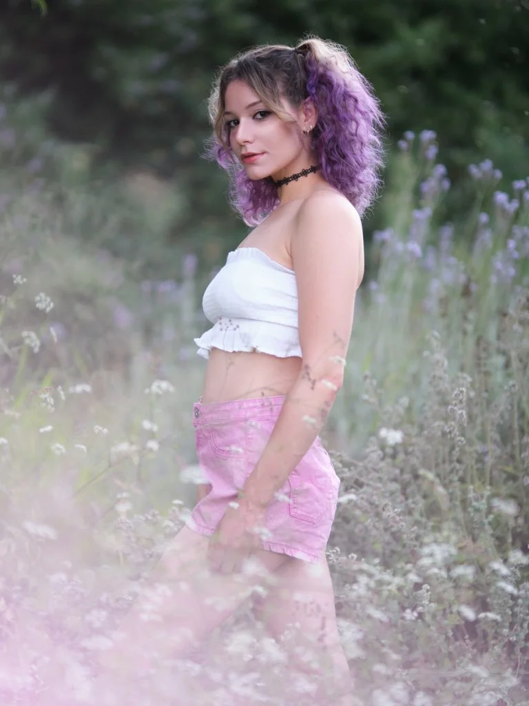 Woman standing in misty outdoor scene